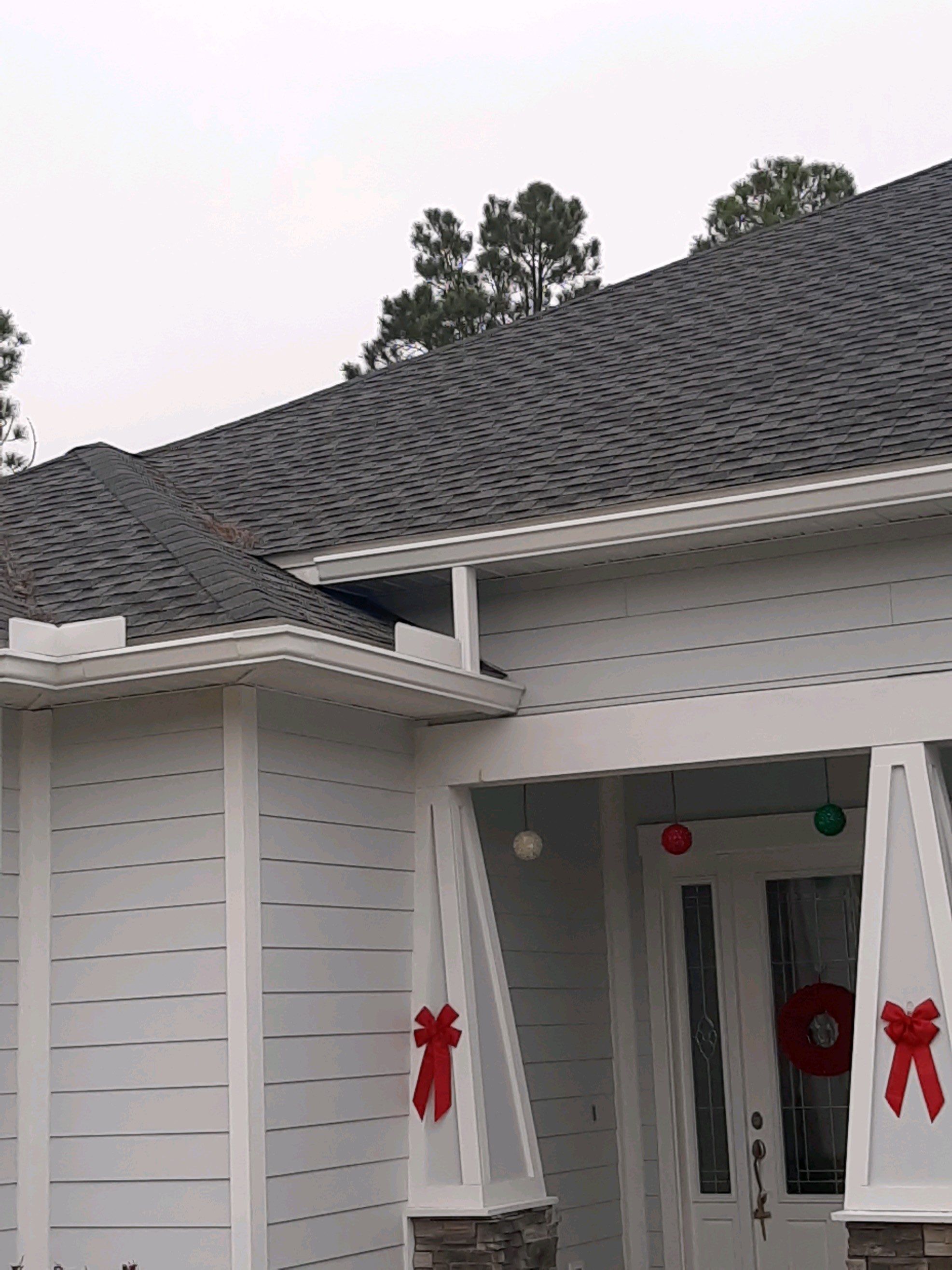 Gutter Installation using White K-Style Seamless Gutters by Gutter Professors