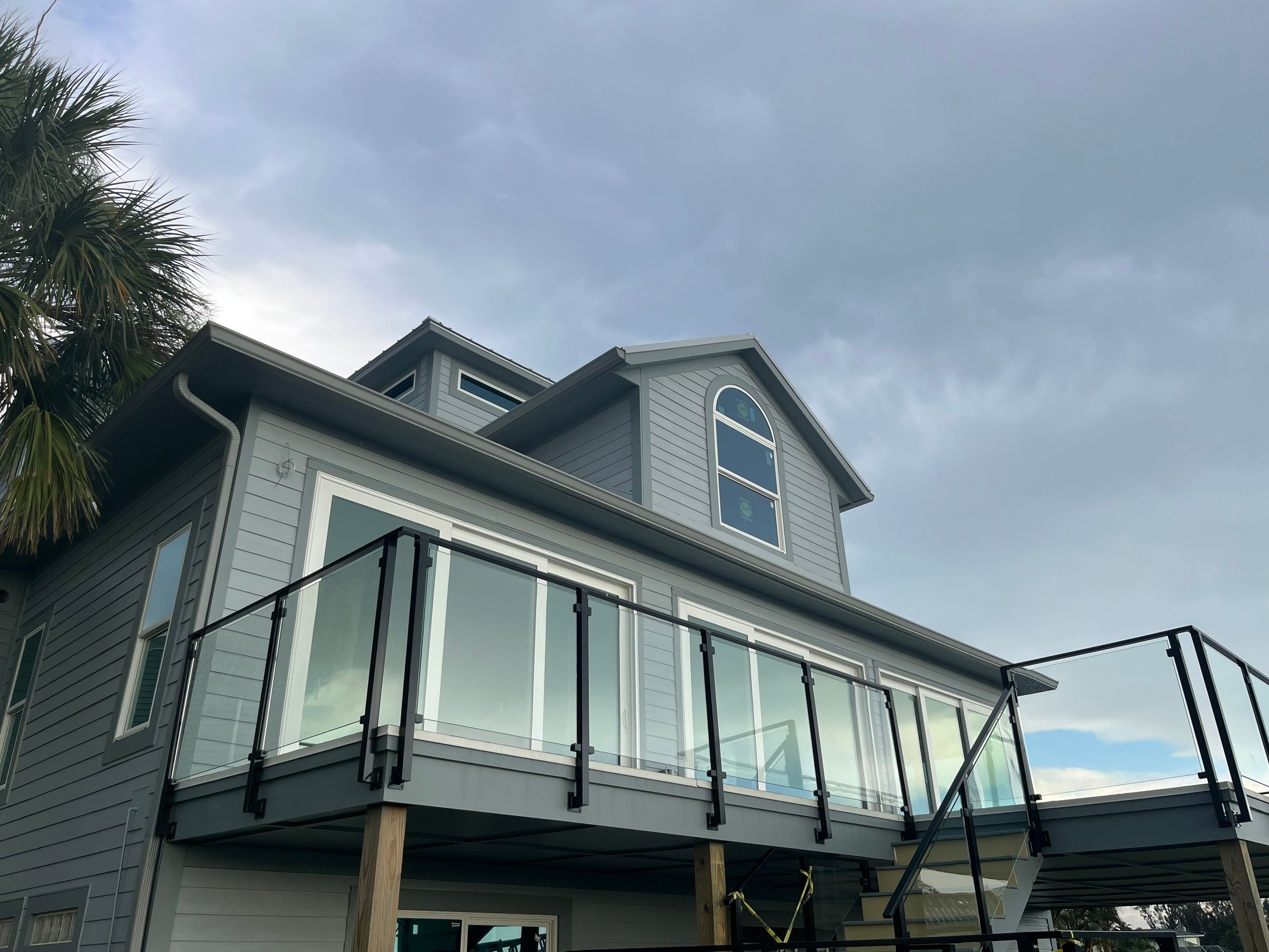 Downspout Installation Dove Grey Palmetto FL by Gutter Professors