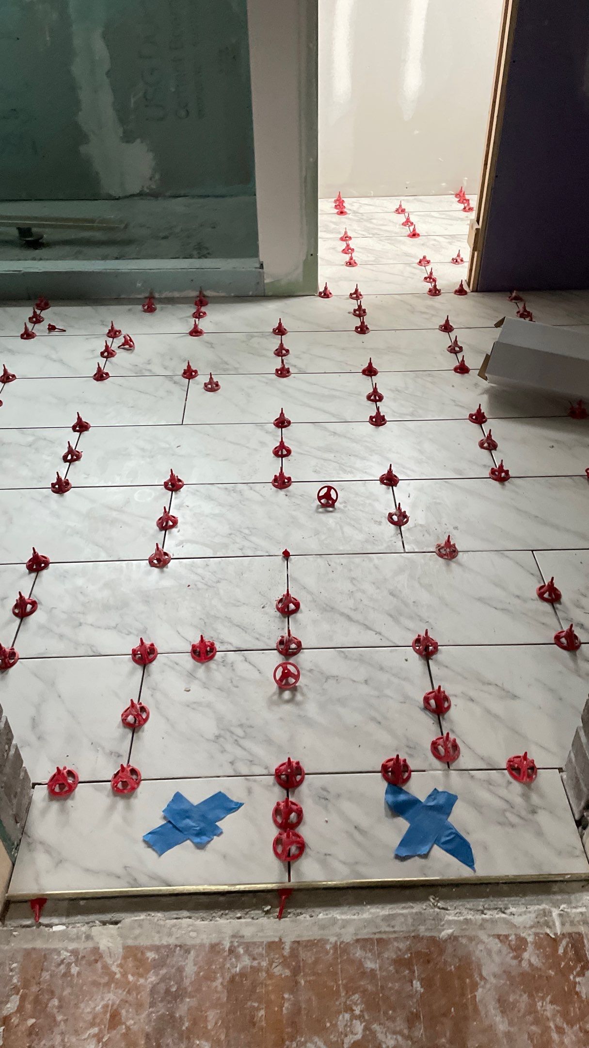 Remodeled Home with new tile floors, Showers and Refinished Oak Floors with stain and Waterbased Finish by Footprints Floors of Coastal Carolina