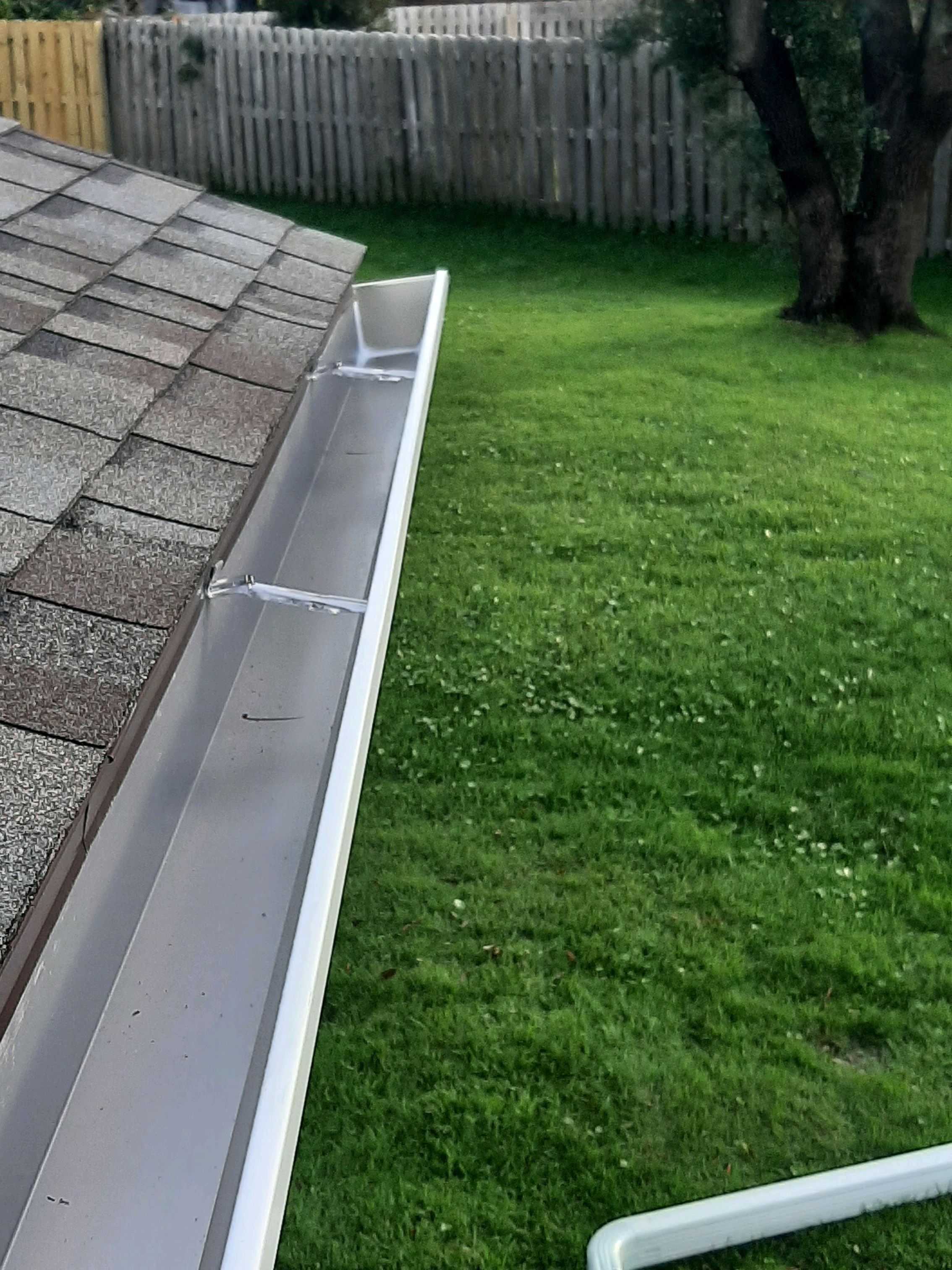 Seamless Gutter Installation using White K-Style Gutters by Gutter Professors