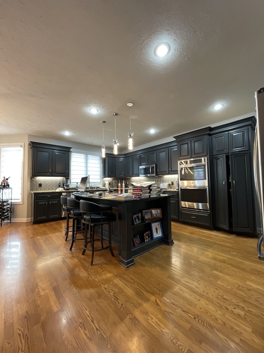 Painting Hardwood using Sherwin Williams paint by Lightning Exteriors