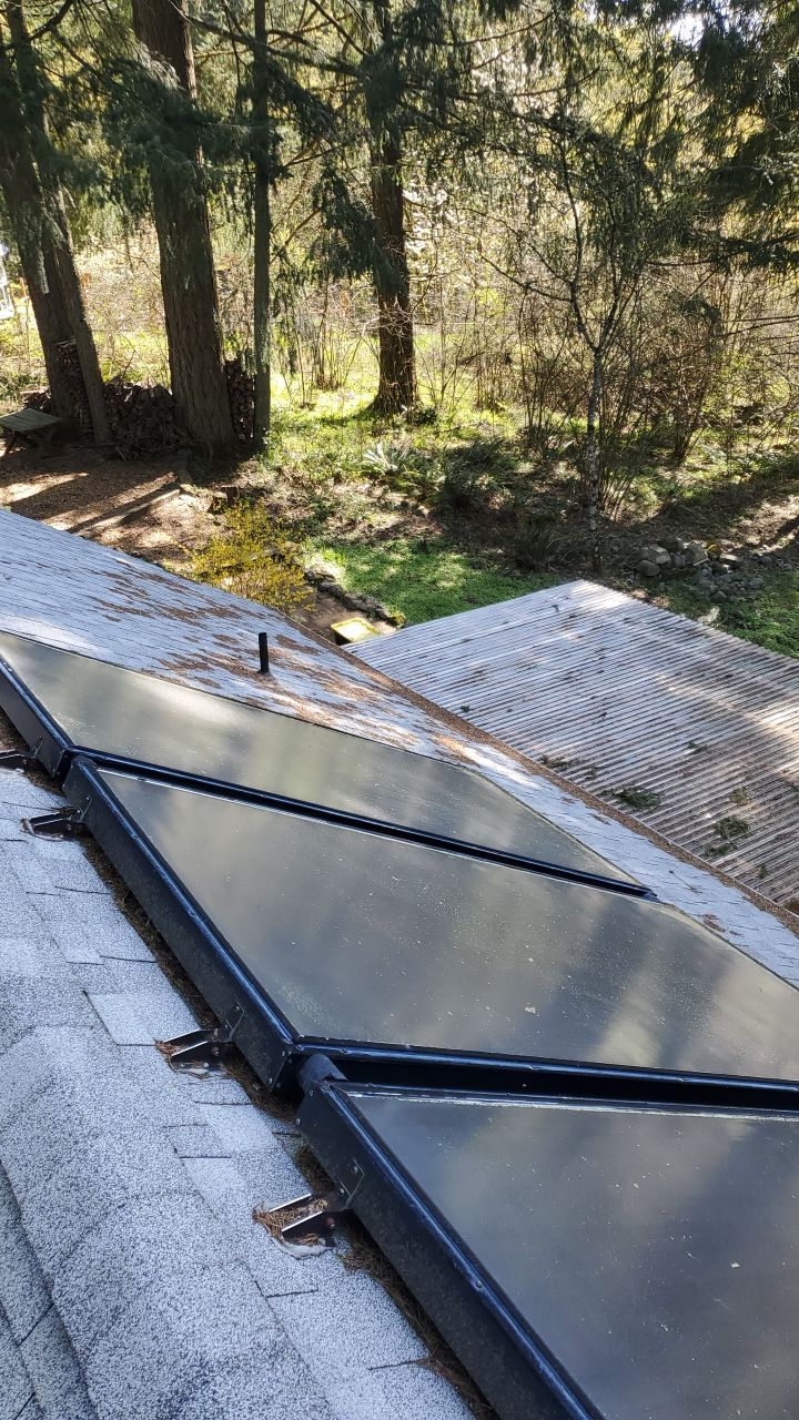Roof Treatment using Surfactant and Biocide by Willamette Outdoor Wash LLC