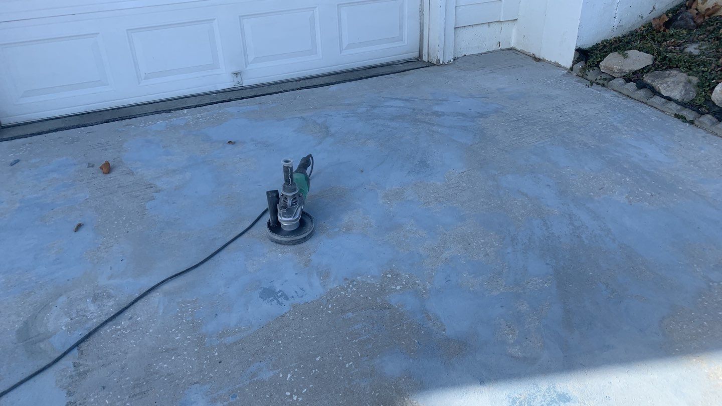 Driveway using Slate Stone by Select Painting, Coatings & Garage Cabinets