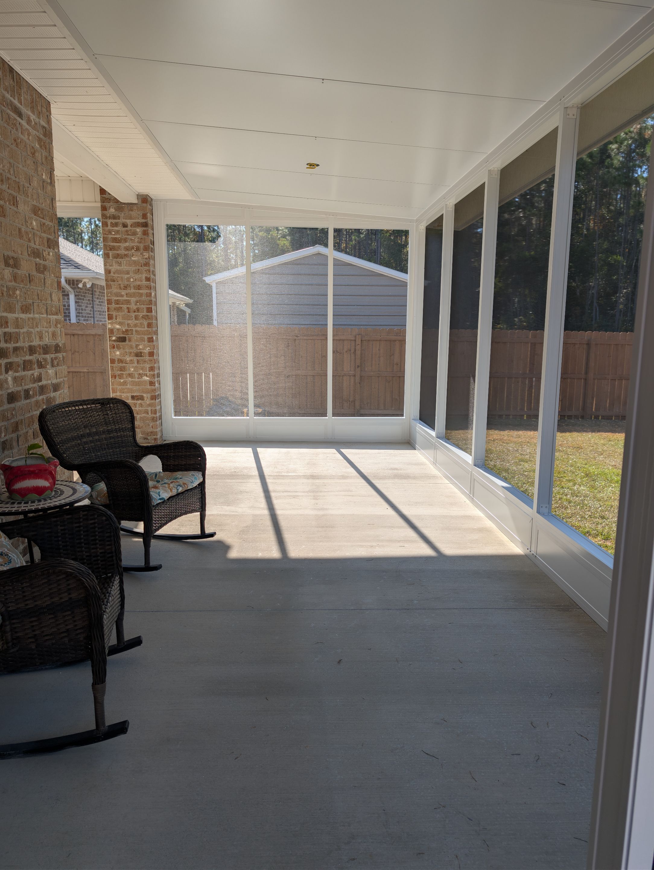 Home addition w/Vinyl 4-Track Windows by Titan Sunrooms