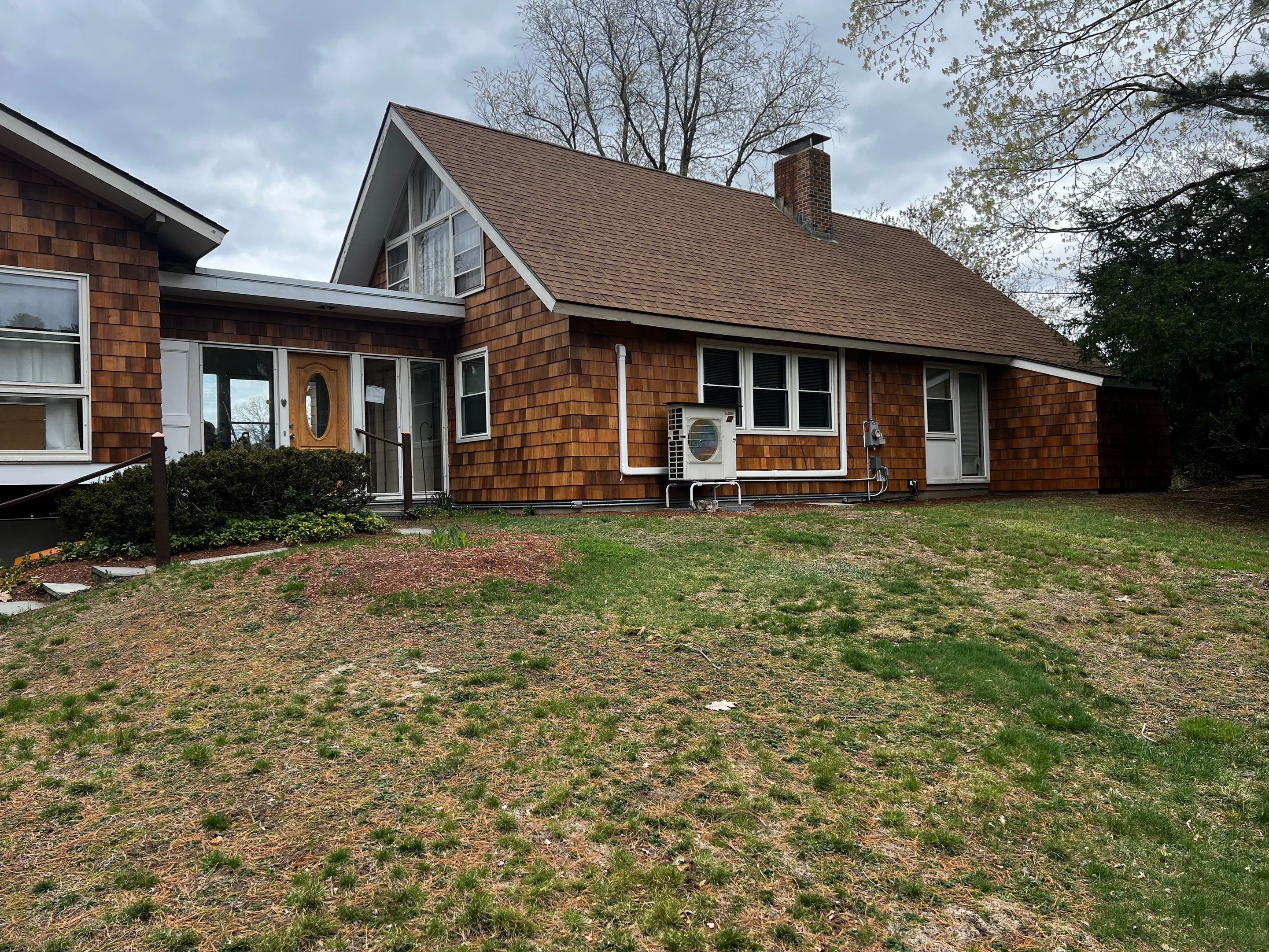Siding Installation using Perfection Red Western Cedar Shingles  by Loyalty Exterior Solutions 