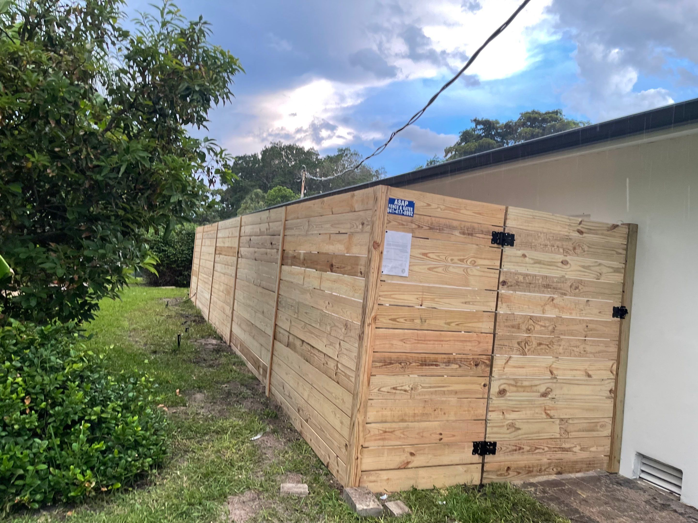 Longboat Key, FL 6ft. Tall Wood Horizontal Privacy Fence by Asap fence and gates, LLC