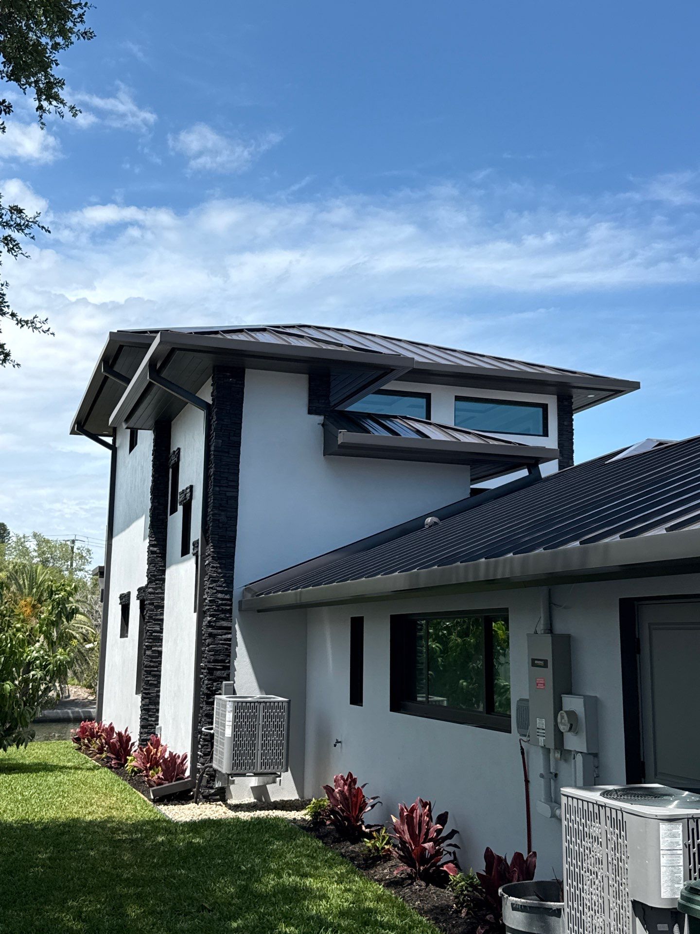 7-Inch Smooth Box Seamless Gutters using black seamless gutters in Siesta Key Fl by Gutter Professors