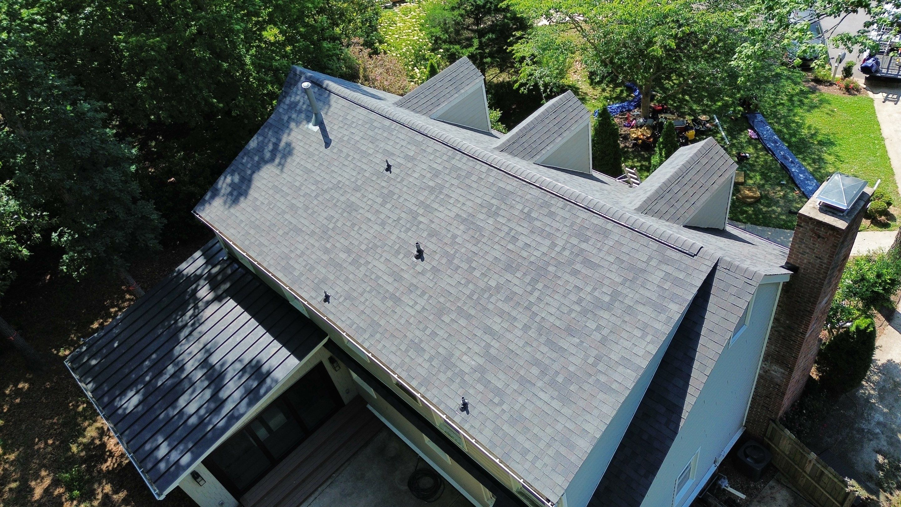 Residential Roof Replacement & Gutter Installation in Cary, NC by Carolina Professional Roofing, Inc