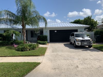 Residential Roofing Installation using 1" Nail strip metal roof