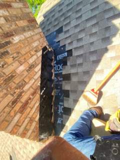 Cricket and Flashing Repair  by Rhino Roofing and General Contracting, LLC