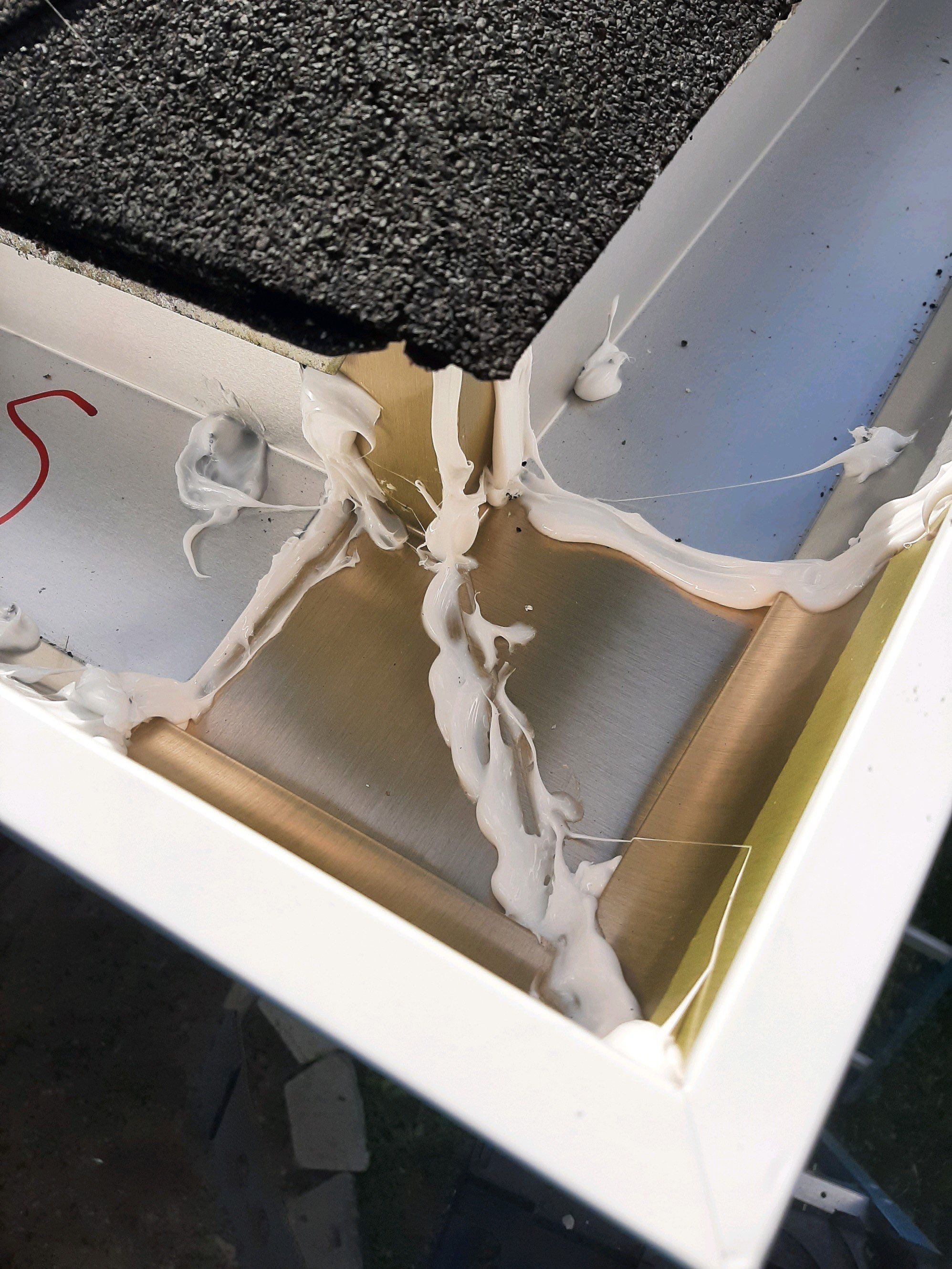 Gutter Installation using White K-Style Seamless Gutters by Gutter Professors