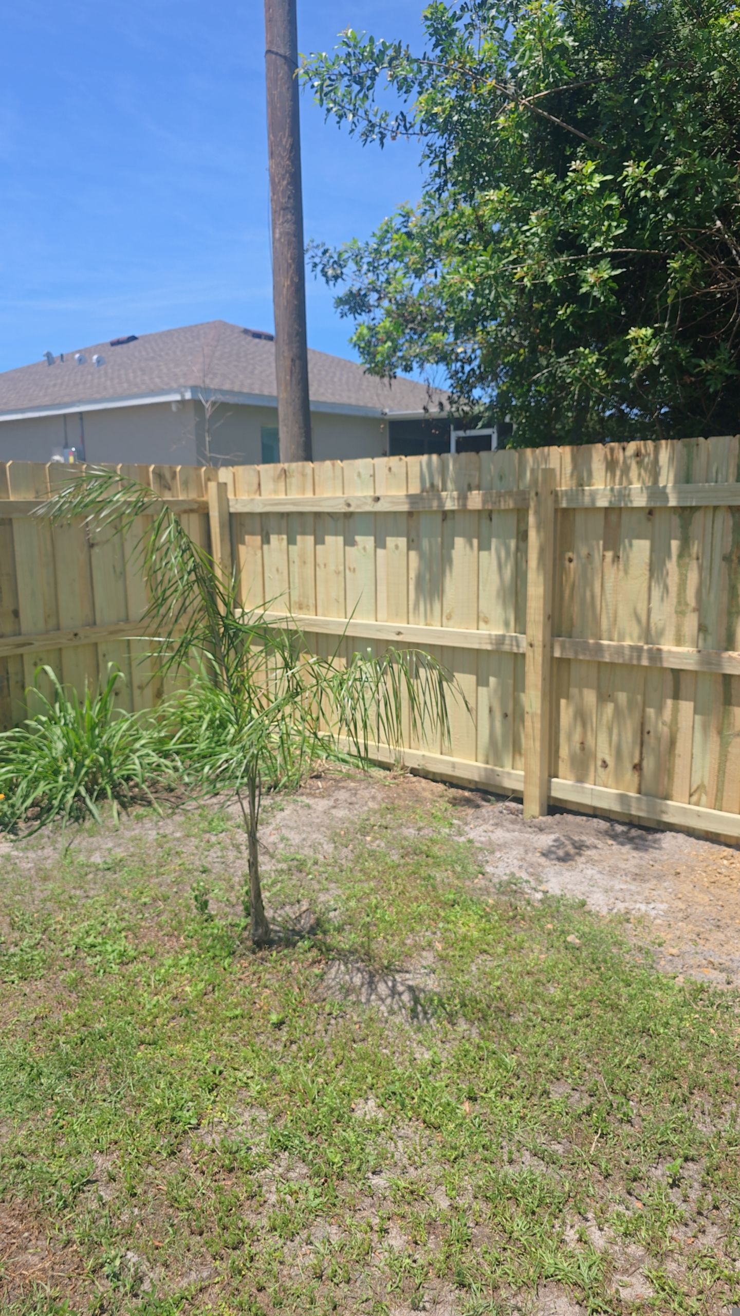 Pressure-Treated Wood Privacy Fence Installation in Port Charlotte by True Fence LLC