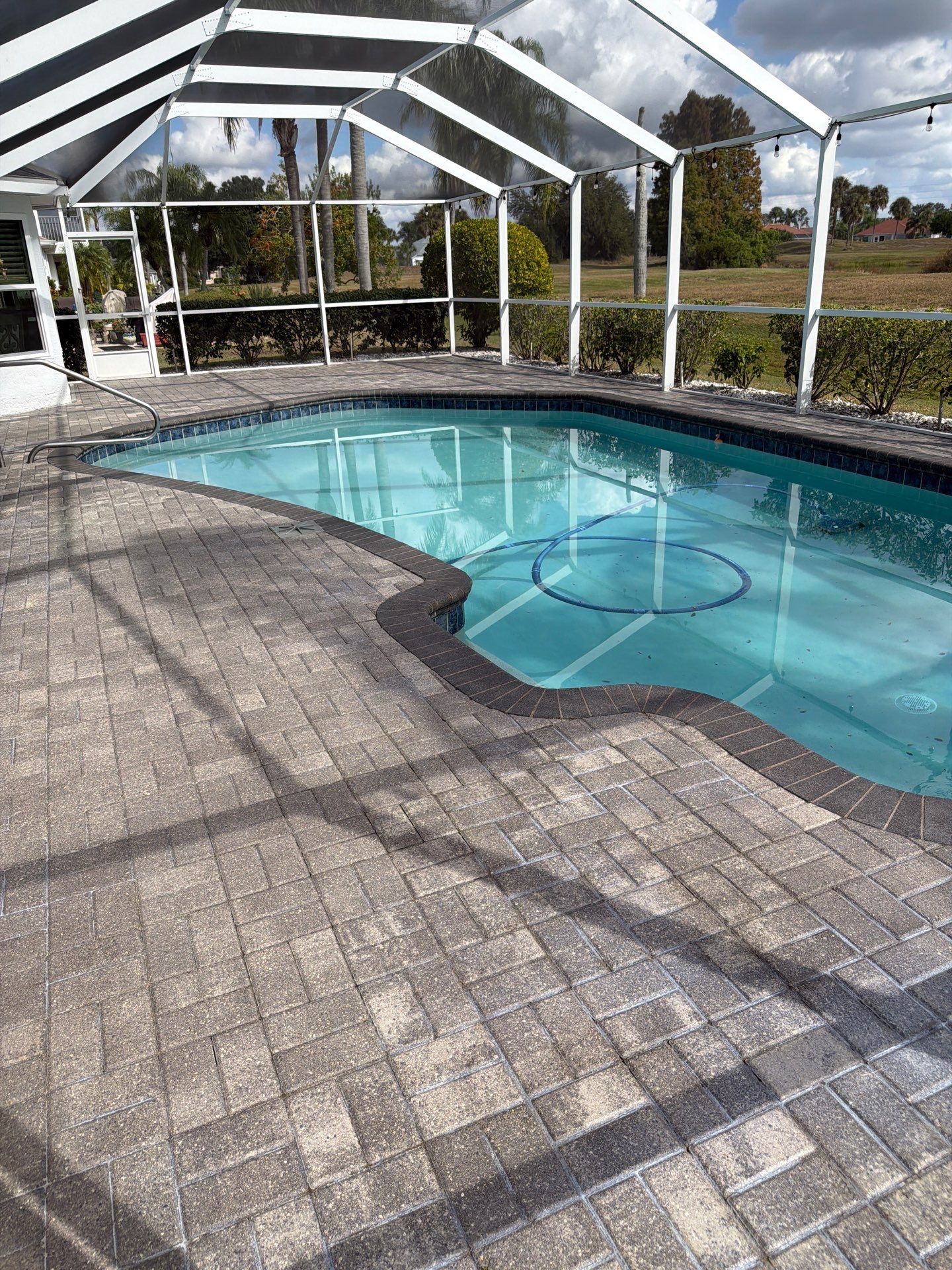 Paver Sealing for Screened Pool Deck in Sun City Center by Supreme Paver Experts