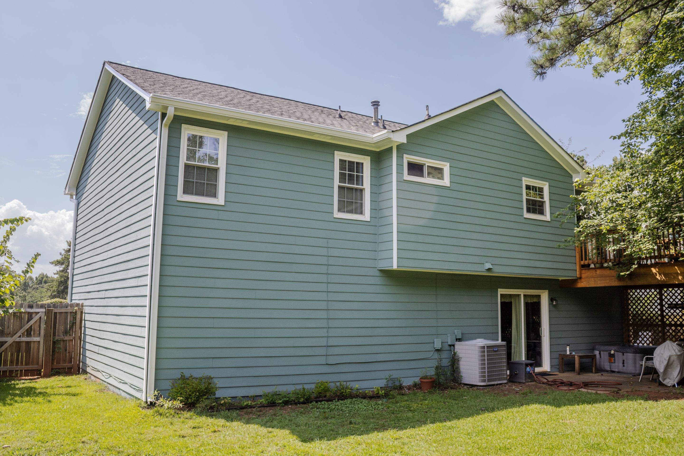Alpharetta, GA Partial Siding Replacement, Porch Stain, and Exterior Painting by Nelson Exteriors 