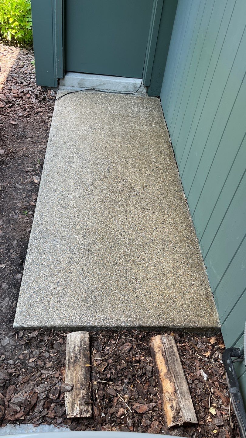 Aggregate concrete cleaning and sealing using Surebond SB-9000 by Northern Power Washing LLC.