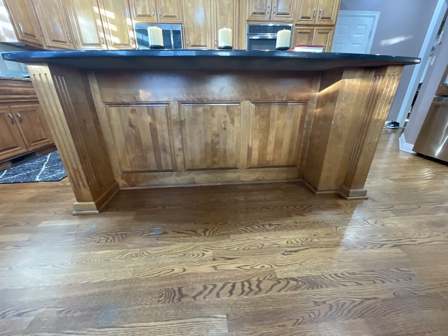 Painting Hardwood using Sherwin Williams paint by Lightning Exteriors