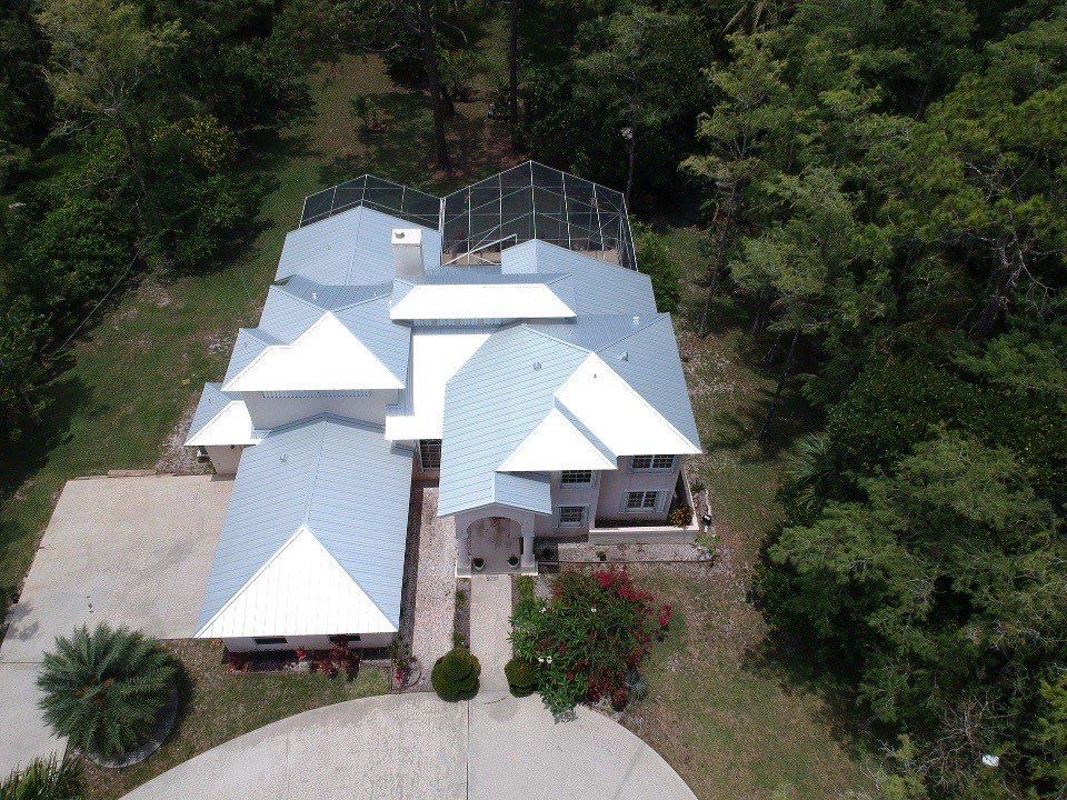 Residential Roofing Installation using 1" Nail strip metal roof by BLUES BROTHERS CONSTRUCTION CORP