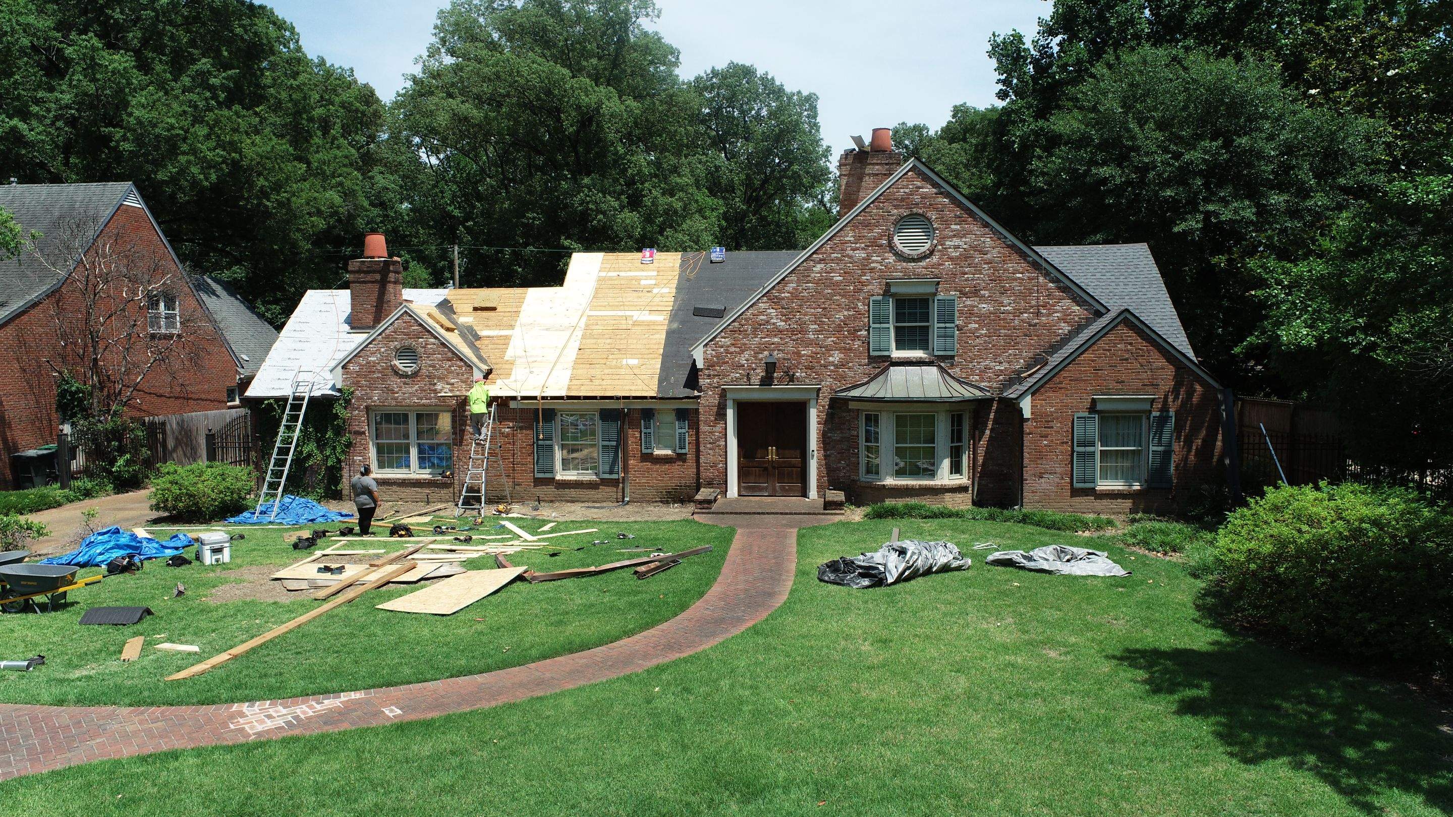 Full Roof Replacement with gutter upgrade after tree impact damage in East Memphis by Revival Roofing Services