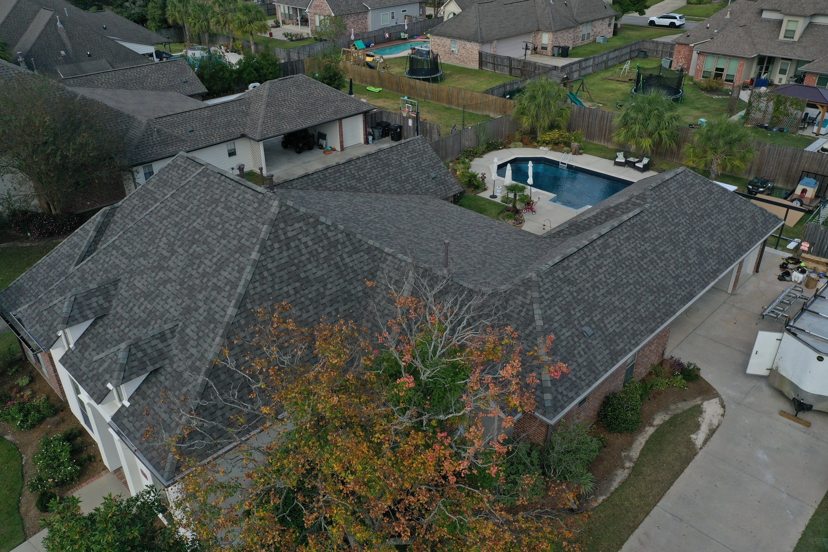 Certainteed Landmark Weathered Wood w patio extension by Top Team Roofing & Construction