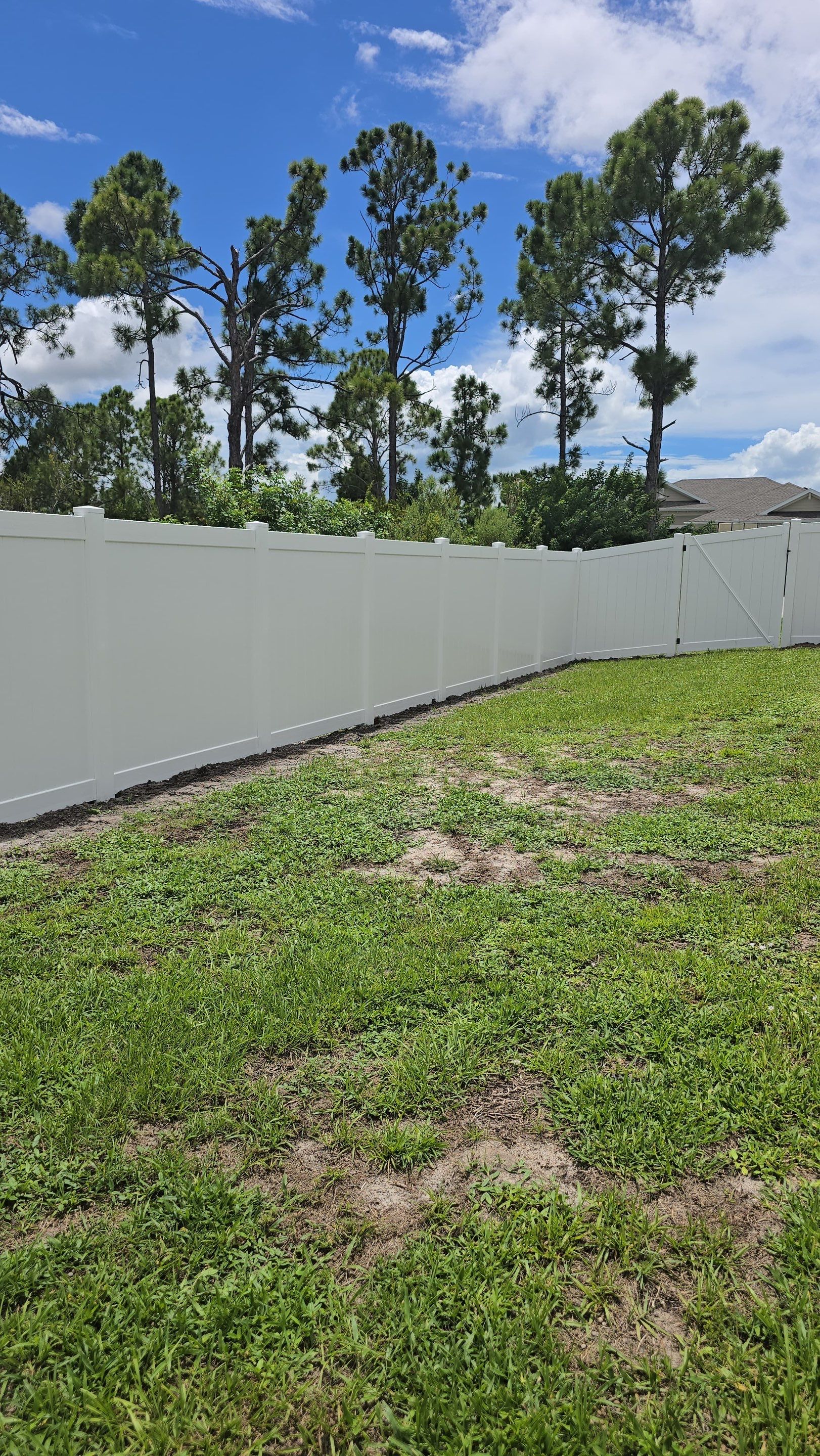 White Vinyl Privacy Fence Installation in Port Charlotte Florida by True Fence LLC