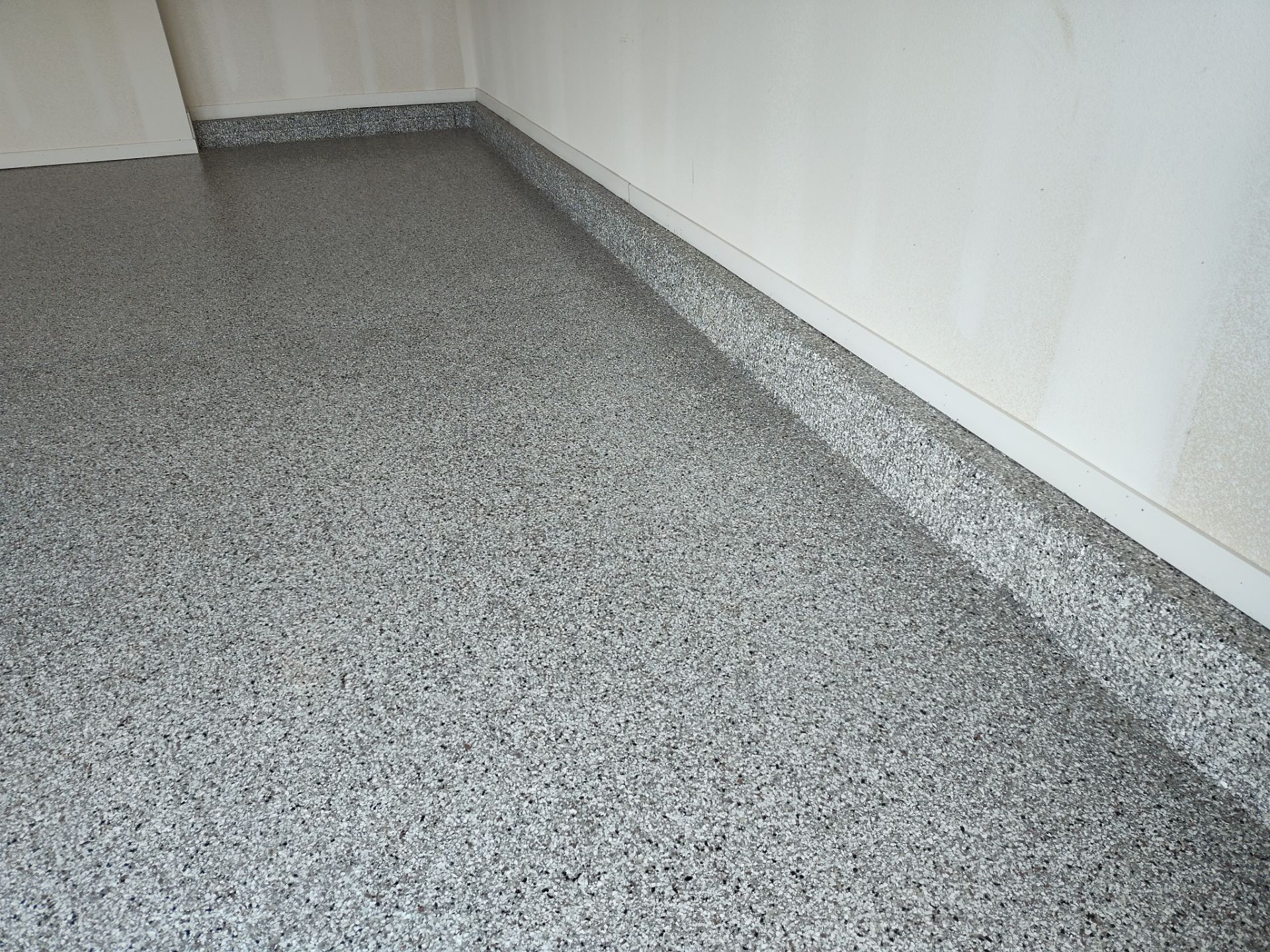 New Bondurant Garage Floor Coating by Revival Concrete Coatings, LLC