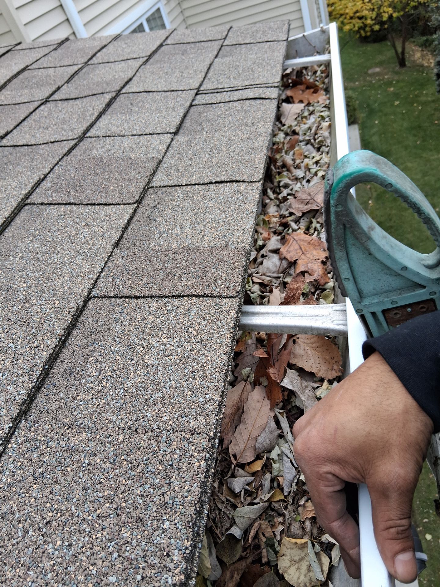 Commercial gutter cleaning New York city before photo with filled gutters
