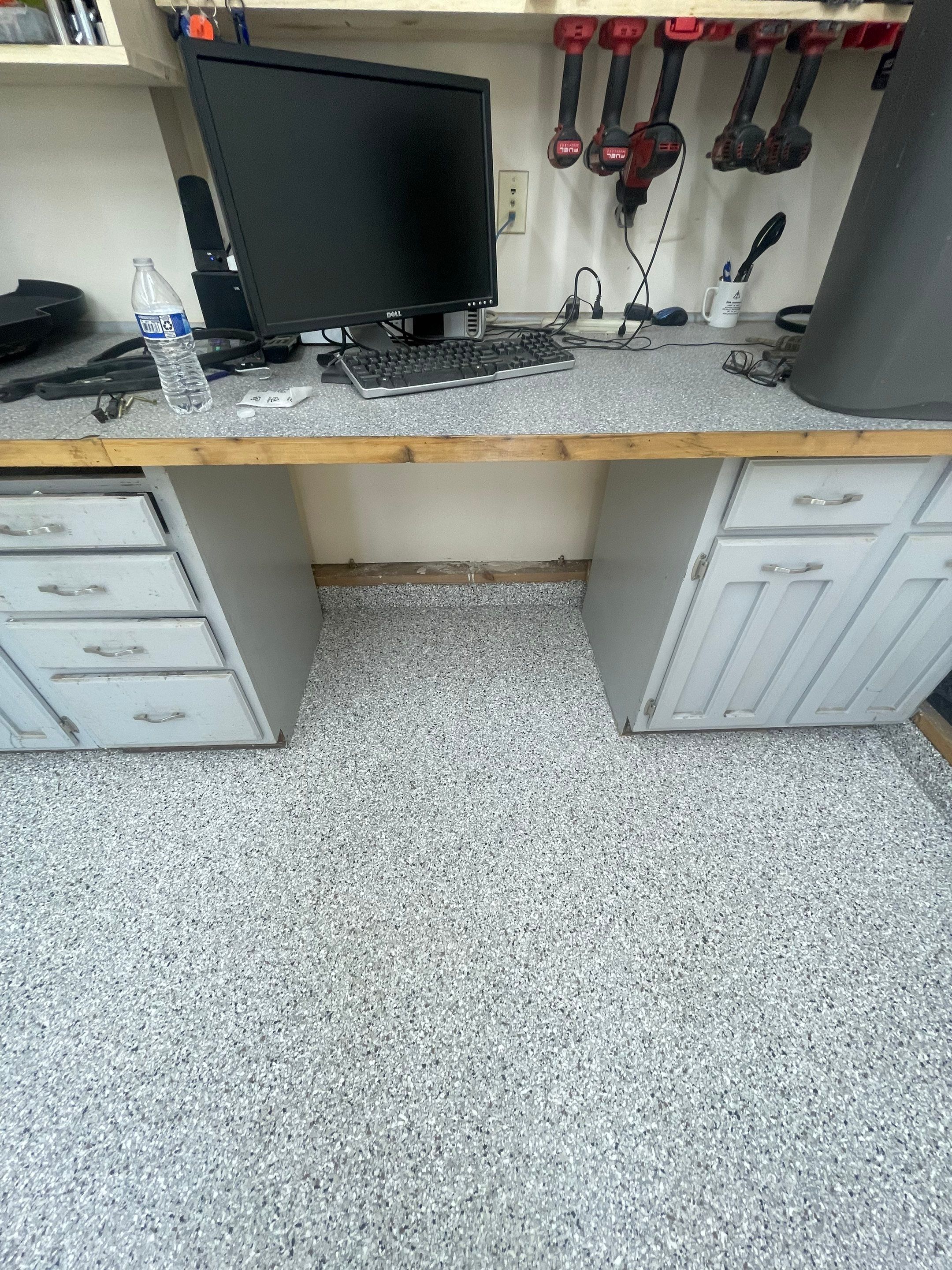 Multi-Stall Garage Floor Coating Installation in Sioux Falls by Select Painting, Coatings & Garage Cabinets