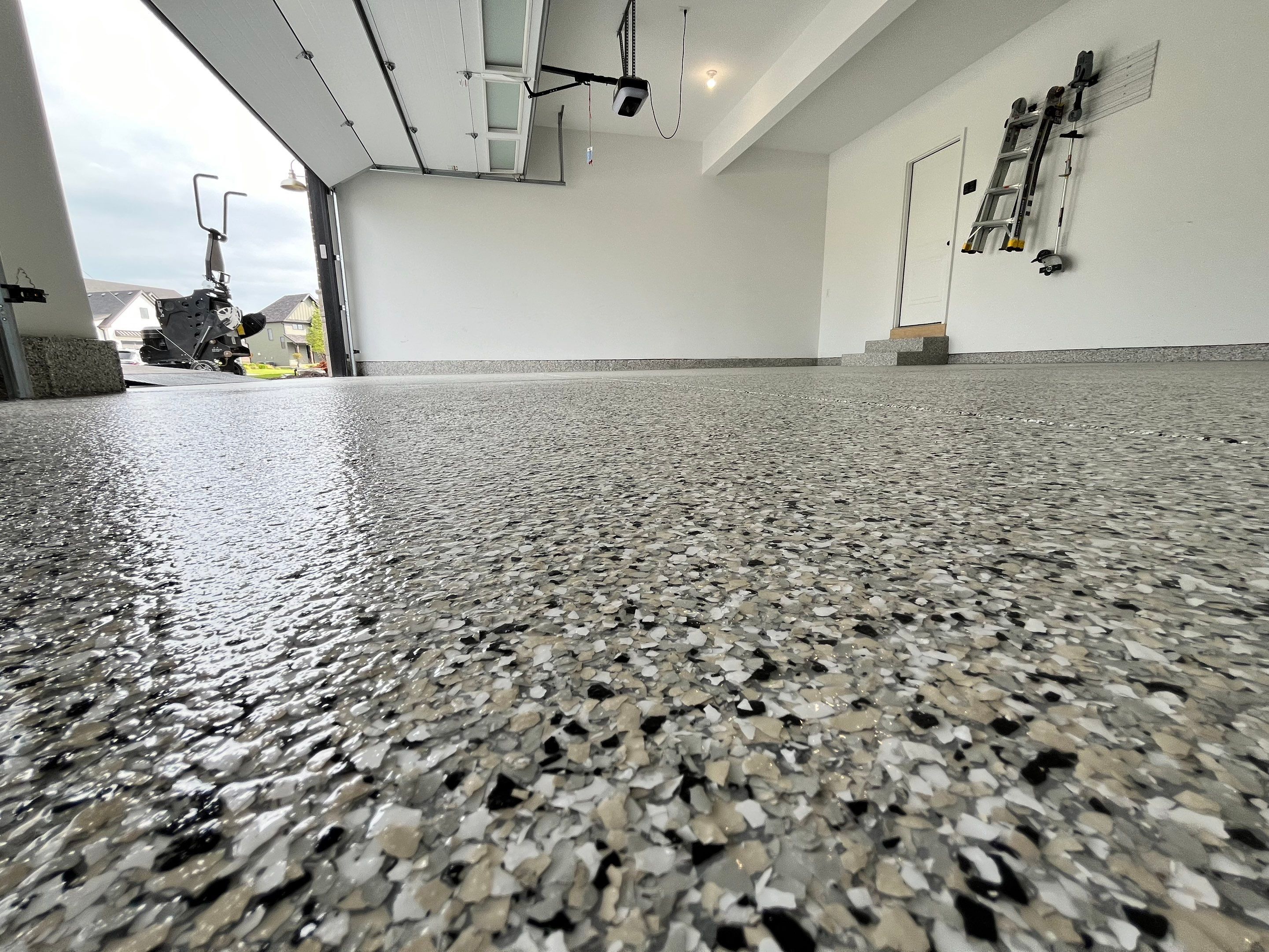 Cabin Fever Flake Garage Floor by Level 10 Coatings