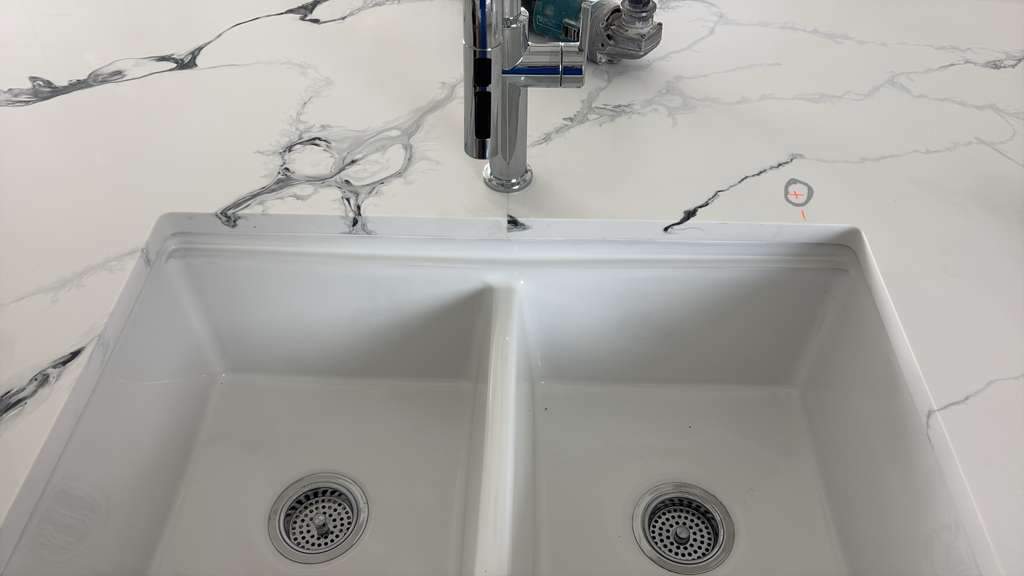 A home with a mix of quartz options by Mena stone surfaces