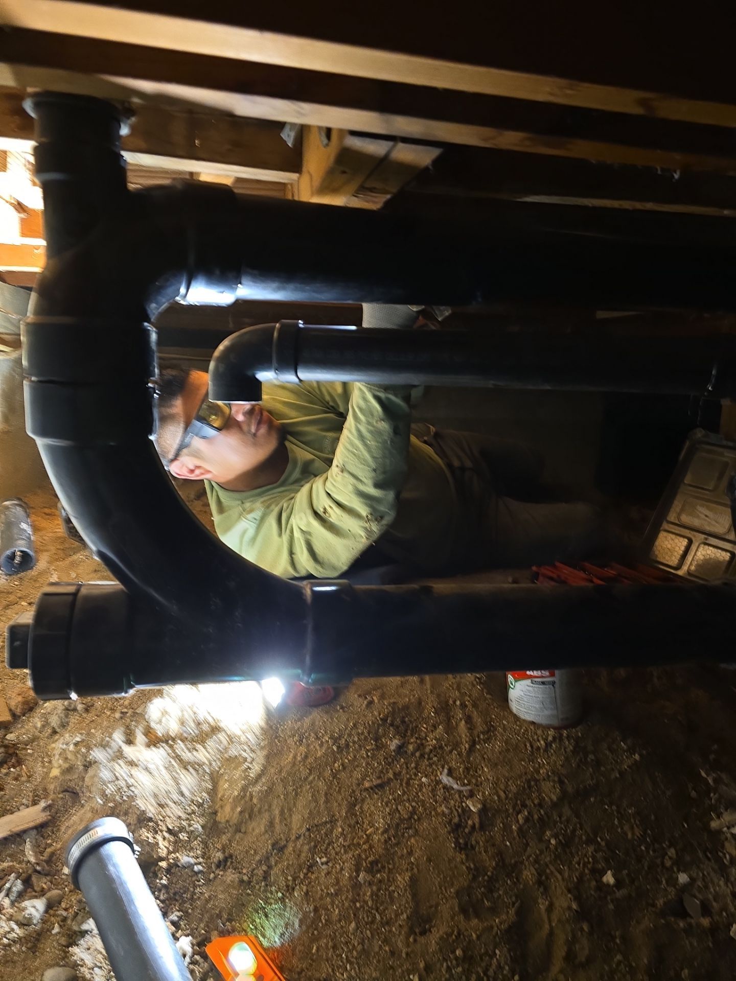 Installation of New Tall Black Piping (Wall to Ceiling) & Underground Piping by Us Plumbing