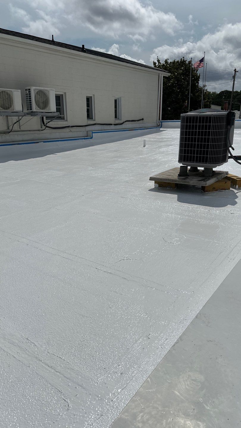 Roof Installation using Flat Roof - EPDM by ExteriorPros