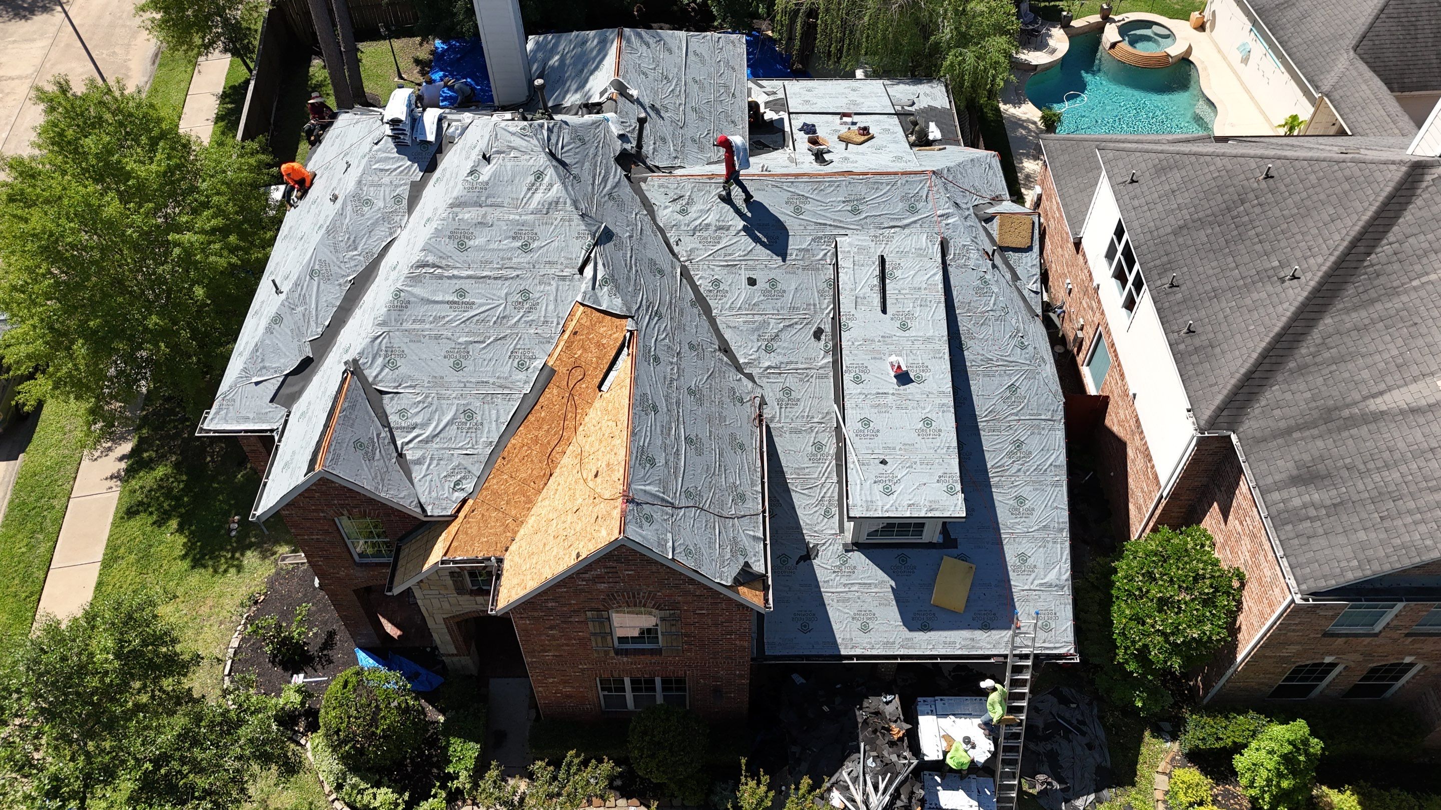 Residential Roofing Installation using Architectural Shingles by Core Four Roofing