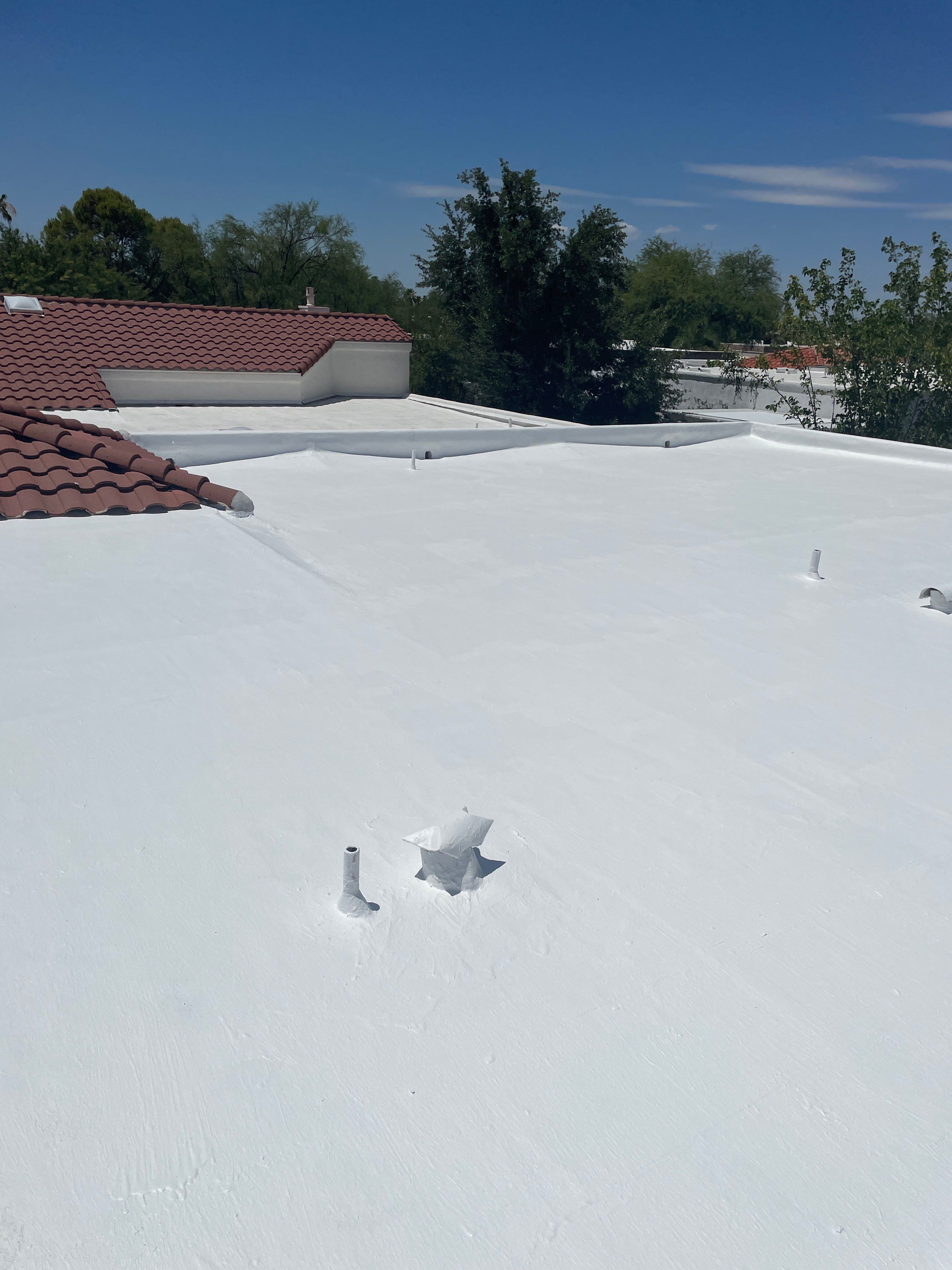 Tucson Residential Roof Restoration with Tile and Elastomeric Coating by West Coast Roofing AZ