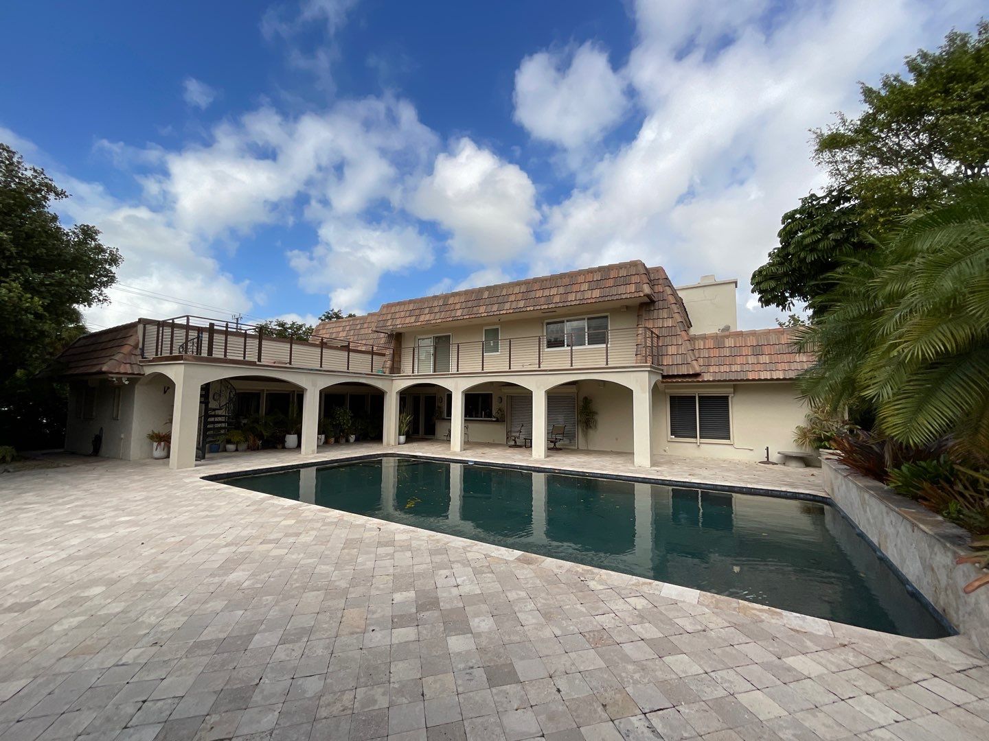 Amazing TPO flat deck re-roof with Eagle mansard in Hollywood Florida.  by First Due Roofing