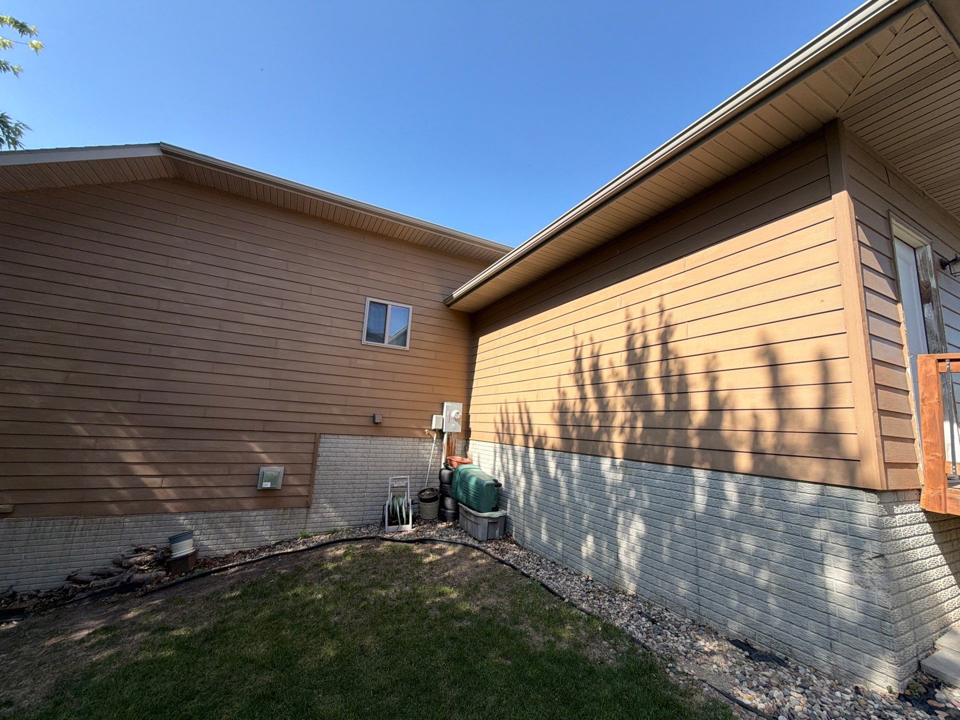 Full Exterior Residential Painting and Siding Refresh in Tea by Select Painting, Coatings & Garage Cabinets