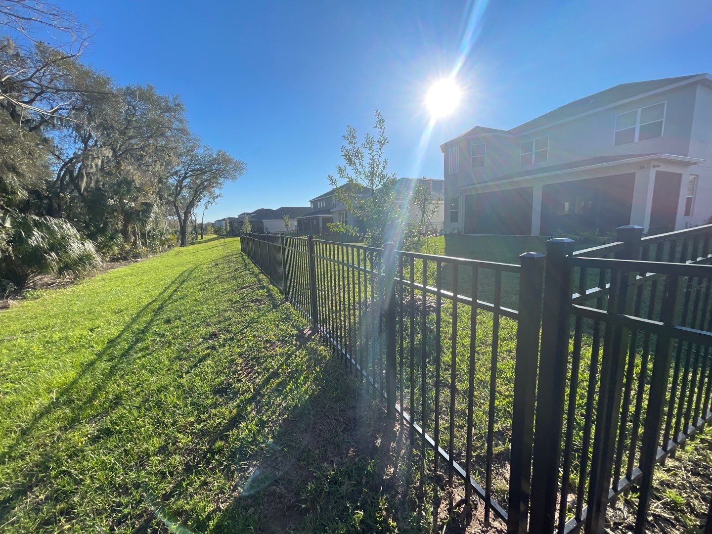 Aluminum Fence Installation using Black 3 Rail Aluminum Fence by Asap fence and gates, LLC