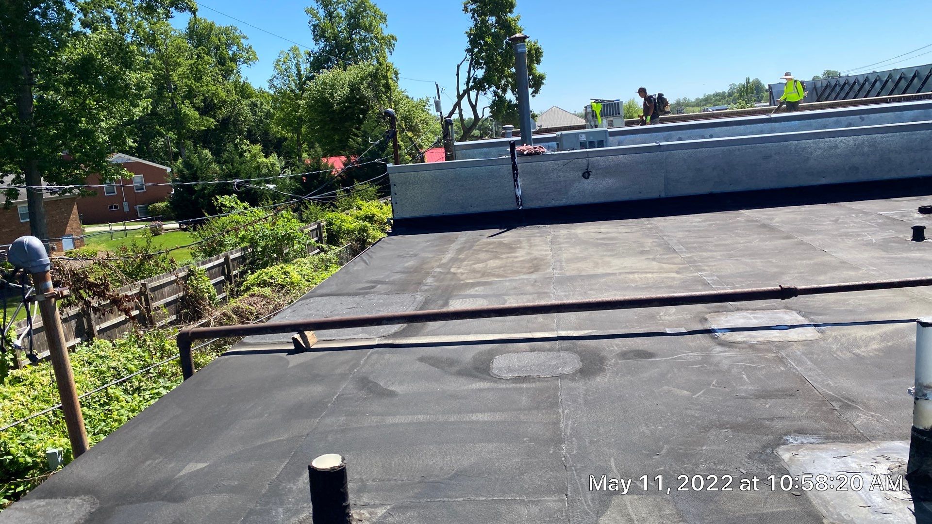 Commercial Roof Coating using Fiberseal basecoat and Silicon Topcoat by Just In Time Roofing and Restoration