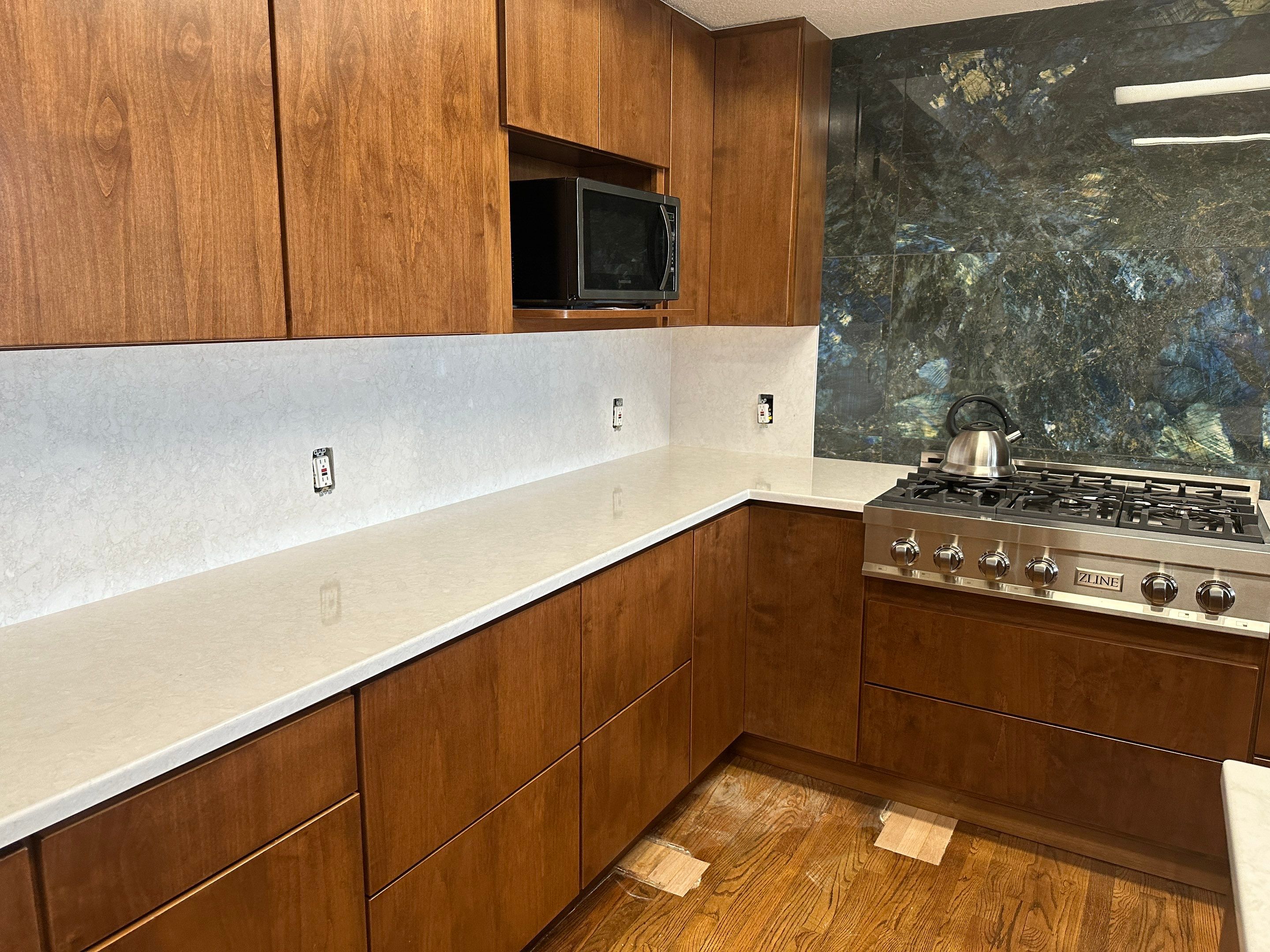 Custom Kitchen Renovation and Master Shower Installation in Pipe Creek by Mena stone surfaces
