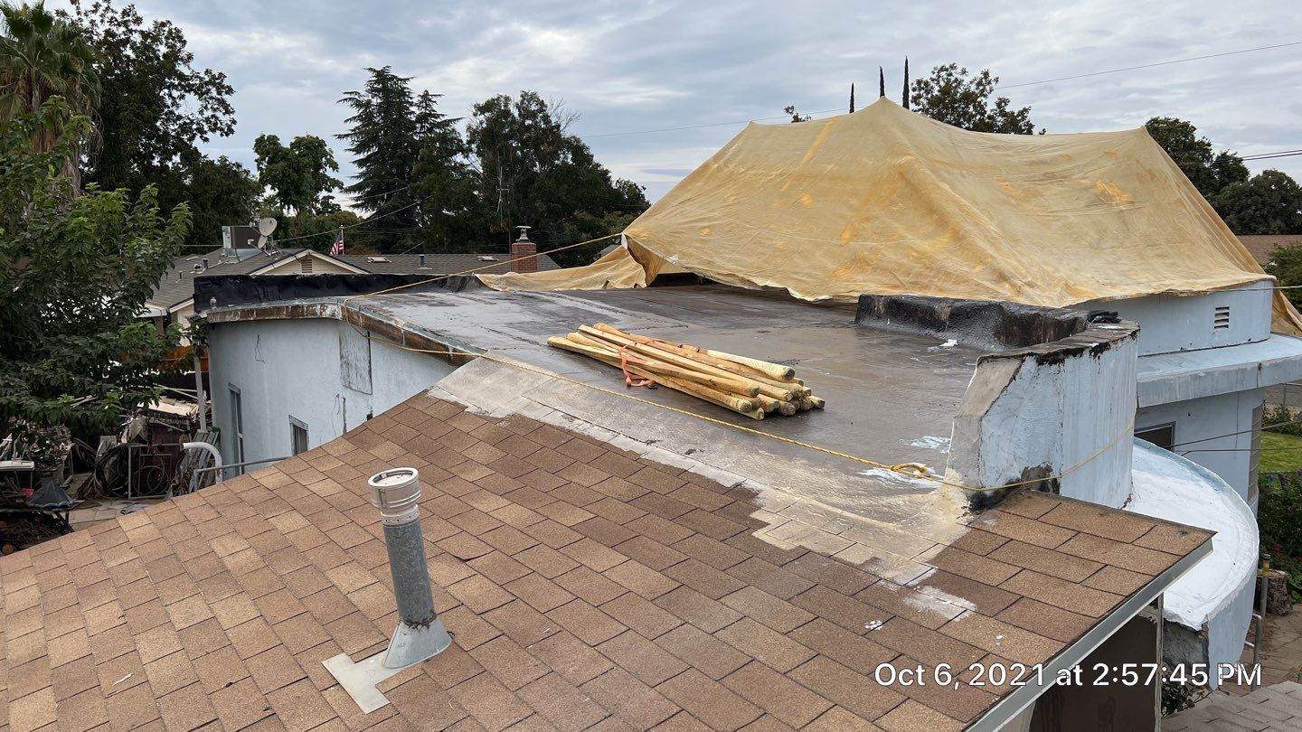 Residential Roofing Installation using Spray foam roofing insulation and General Coatings acrylic coatings by Straight Edge Roofing Inc
