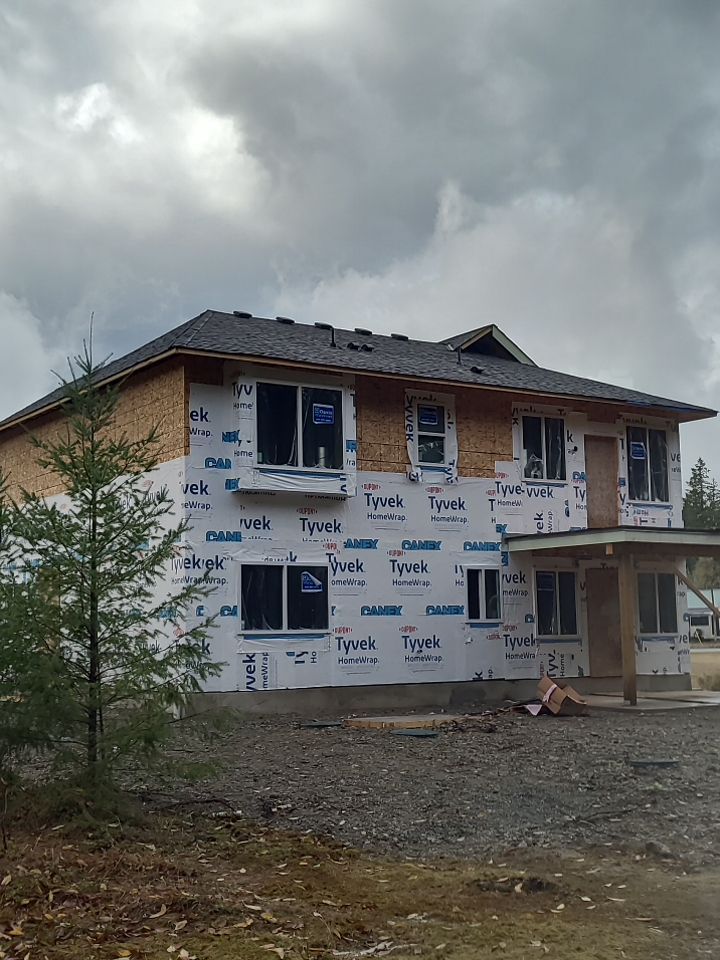 Residential Roofing Installation using OC Oakridge shingles by Top Notch Roofing Inc