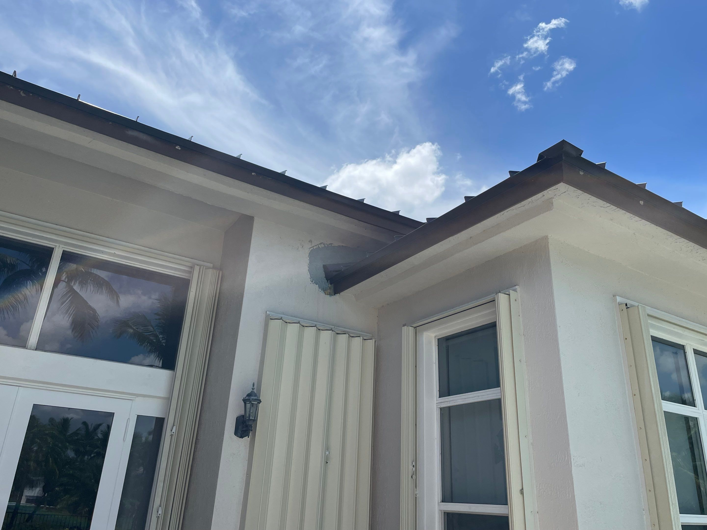 24ga 1.5" Mechanical Seam Dark Bronze by Total Roofing System The Metal Roof Experts