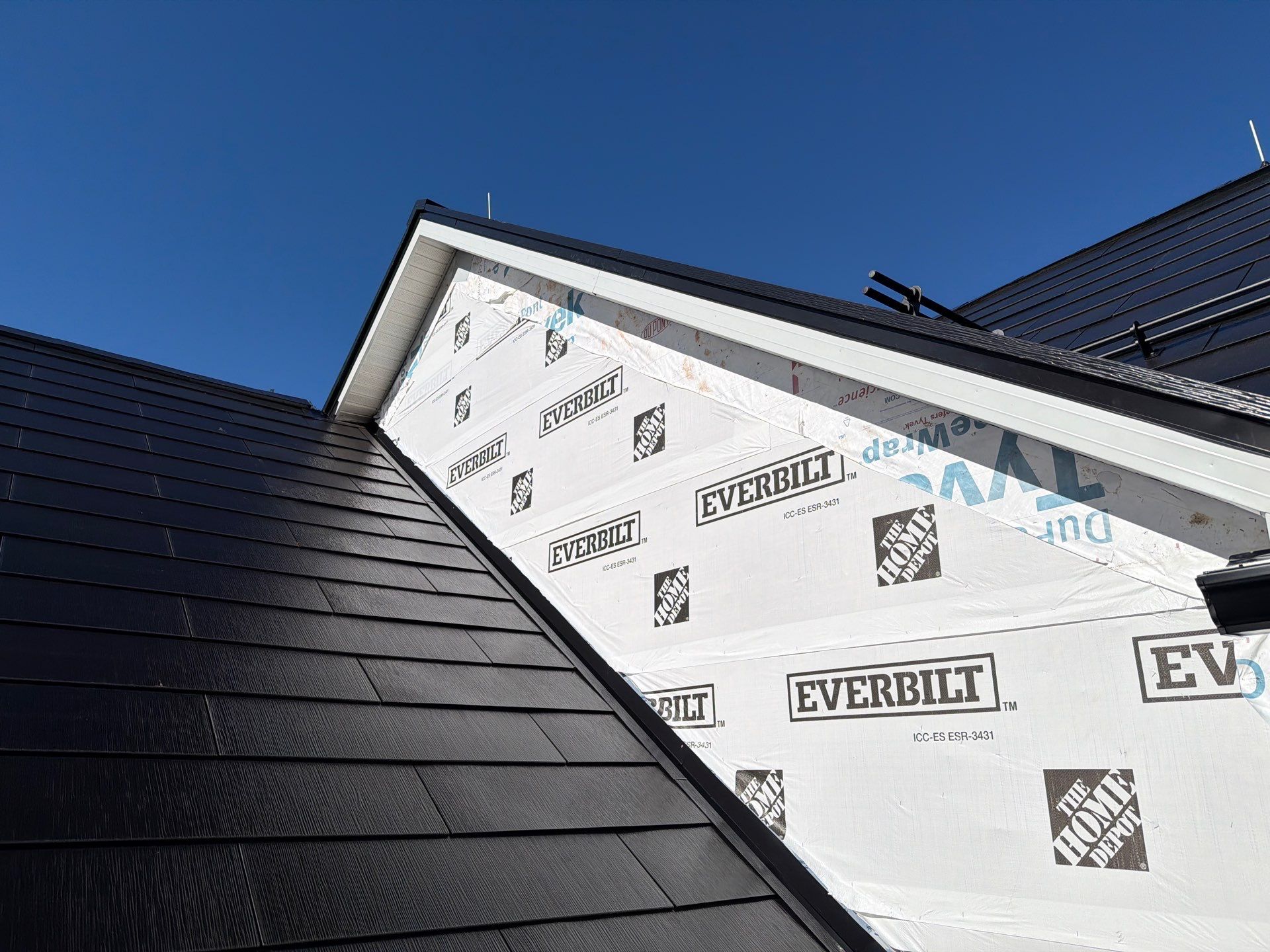 Beautiful James Hardie Siding & Tesla Solar Roof by American Home Contractors