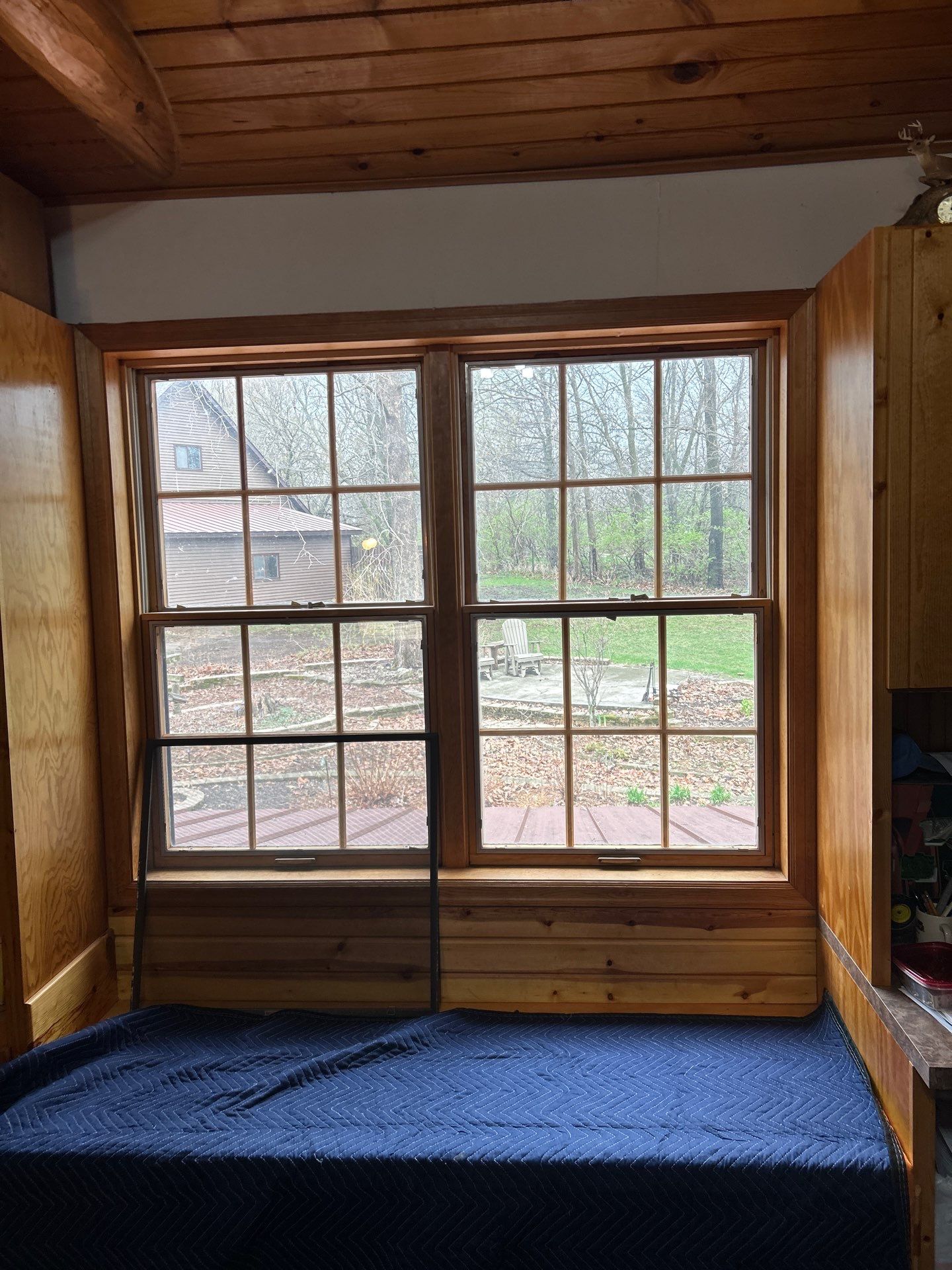 Pella Window installation using Pella Lifestyle wood/Aluminum window by United Windows and Siding LLC