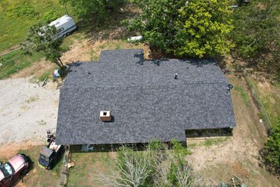 Storm Restoration Reroof: 40 Year Impact Rated Architectural Shingle