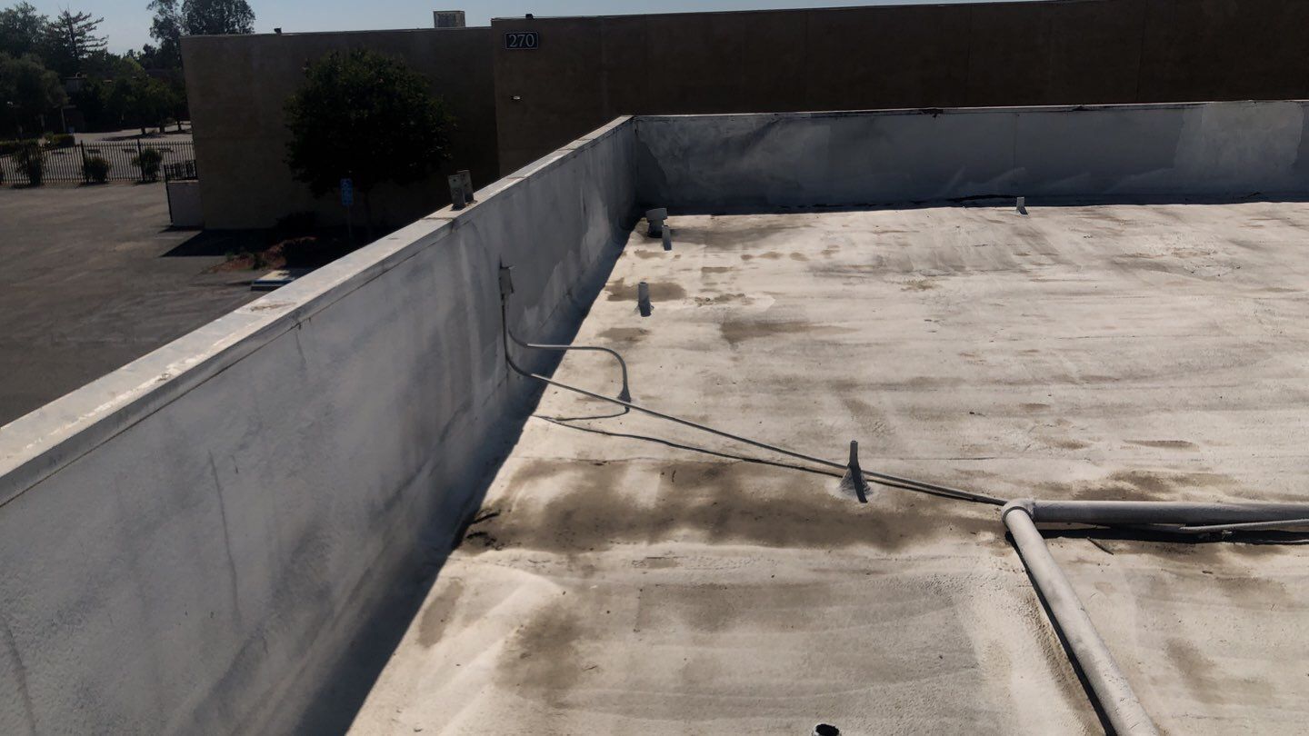 Reburbish existing spray foam job by Straight Edge Roofing Inc