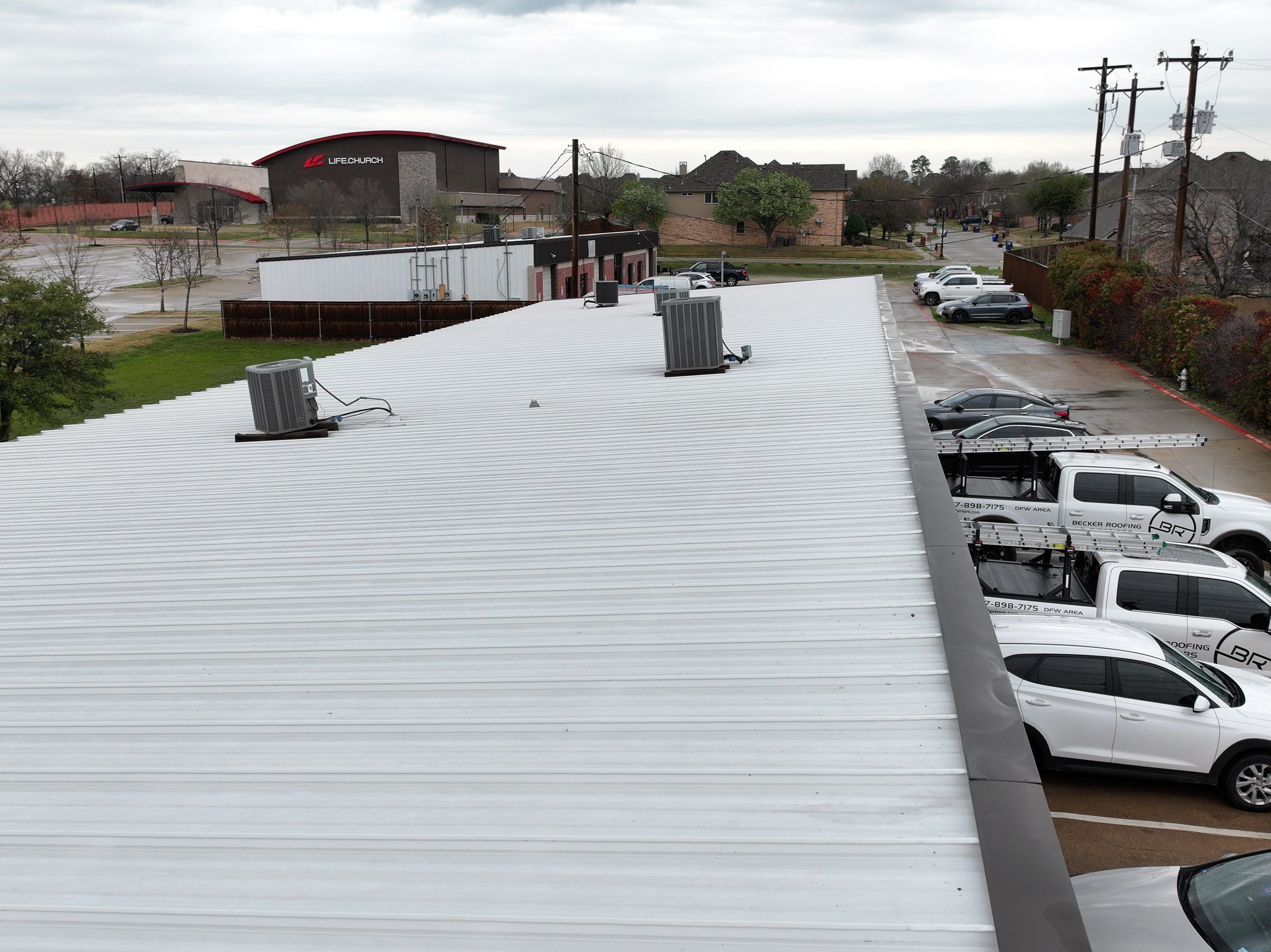 Commercial Roofing Installation using Double lock Mechanical Standing Seam Metal by Becker Roofing and Exteriors
