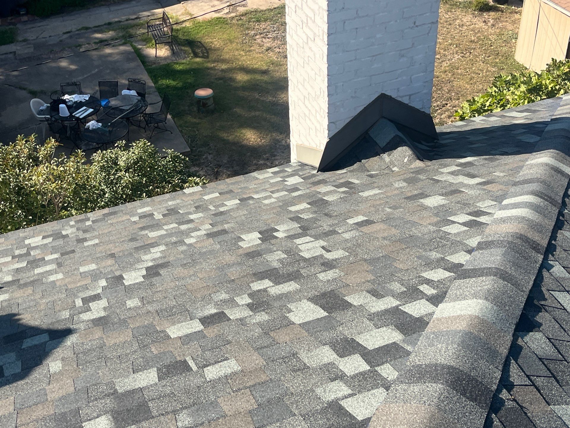 TAMKO Thunderstorm Grey-White Brick  by Tejas Roofworks + Restoration