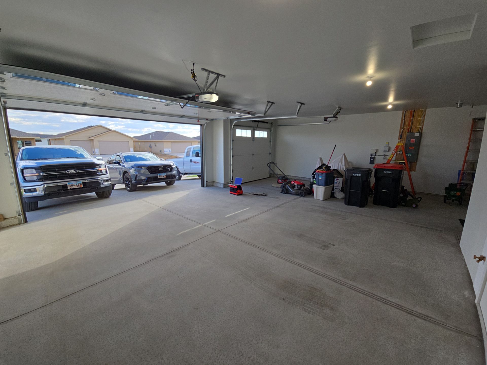 High-Gloss Epoxy Flake Garage Floor Coating in Brandon by Select Painting, Coatings & Garage Cabinets