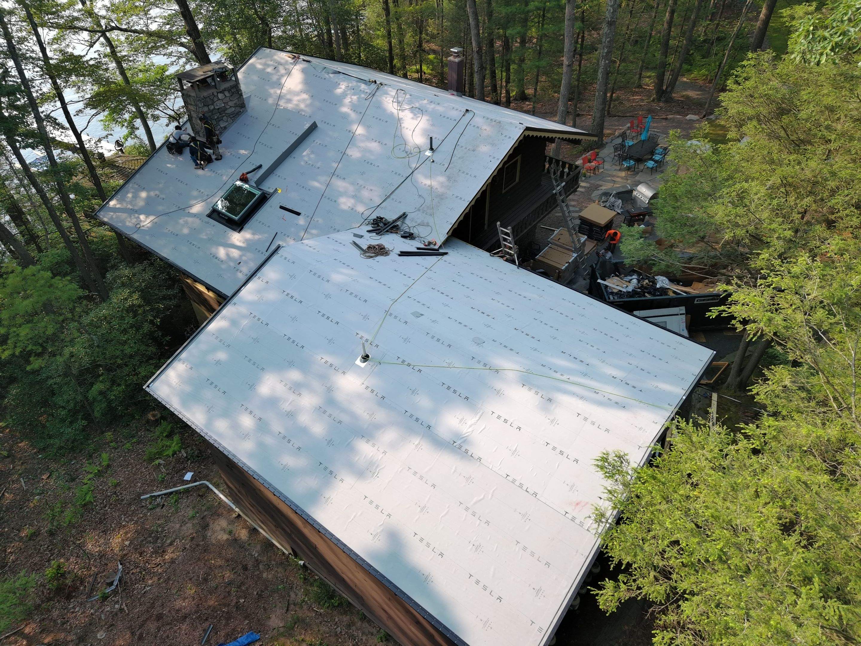 Stunning Tesla Solar Roof Cabin in the Woods by American Home Contractors