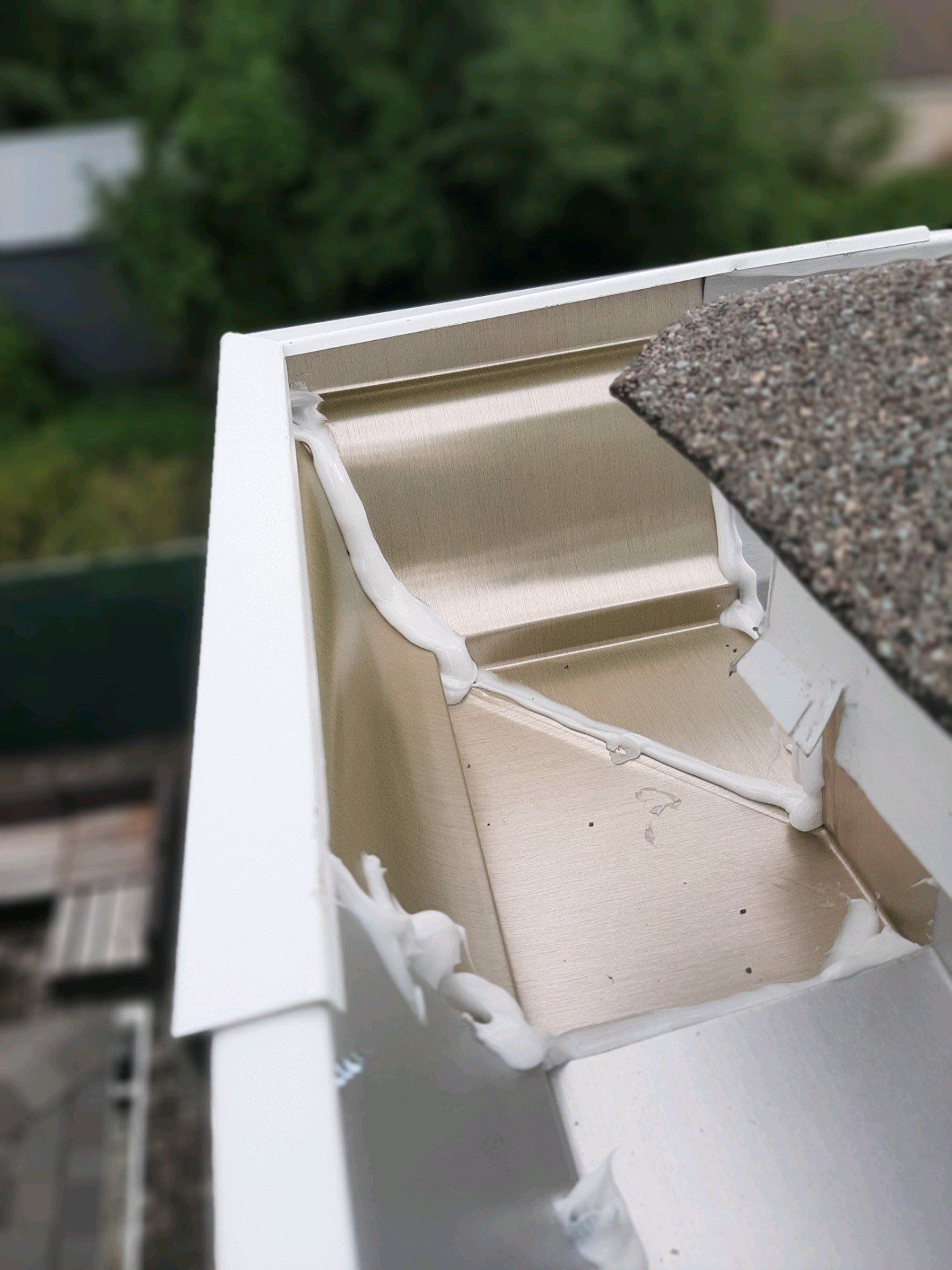 Seamless Gutter Installation using White K-Style Gutters by Gutter Professors